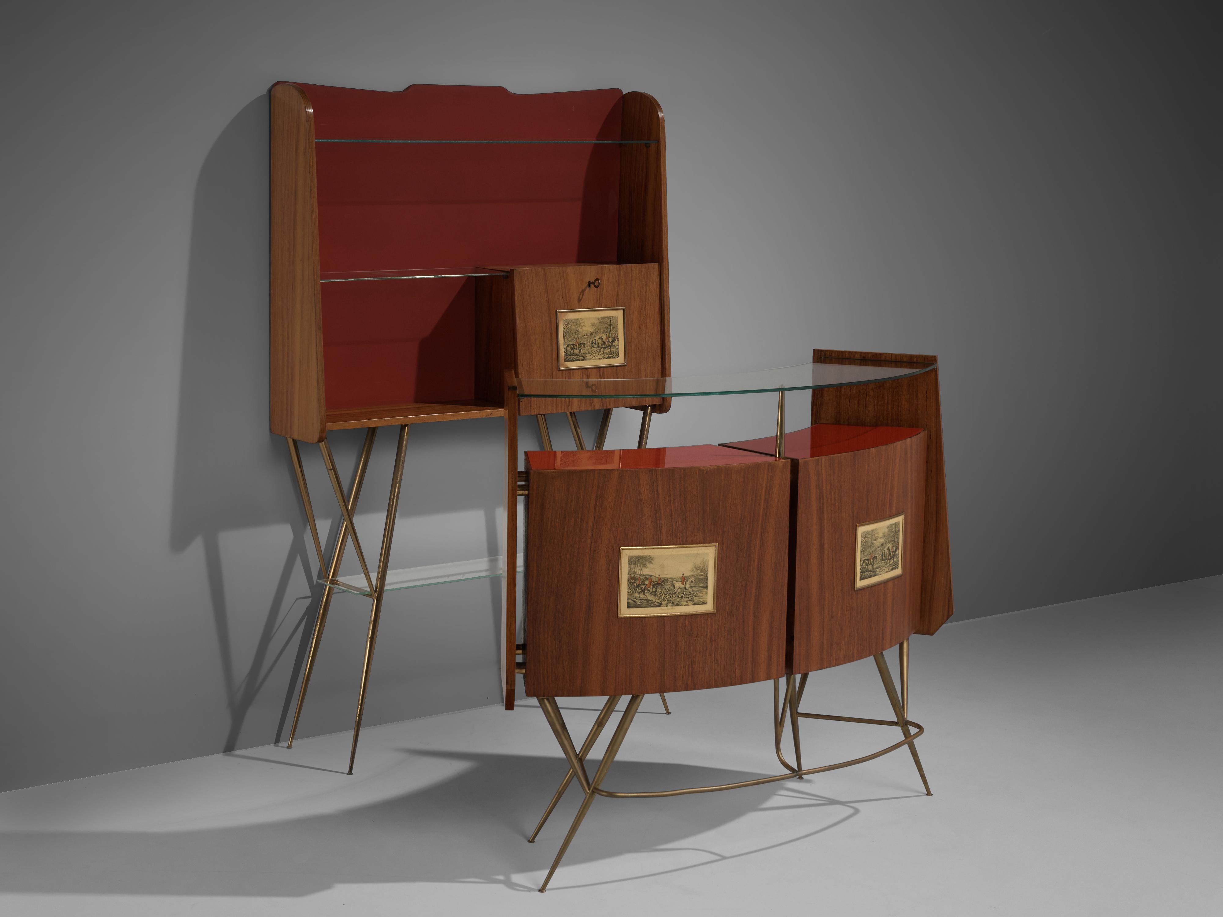 Dry bar with additional cabinet, rosewood, glass, metal, Italy, 1950s
 
This set of free-standing dry bar and high-legged cabinet is a wonderful example of Italian midcentury design. The way both items are lifted up by tapered legs in brass could