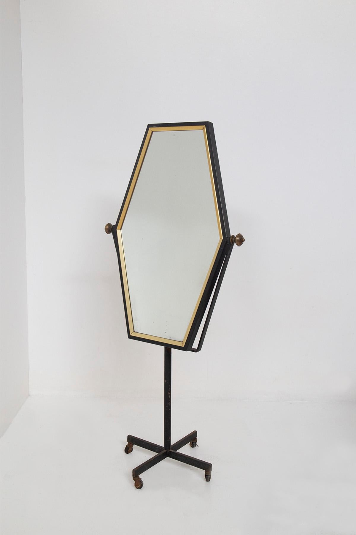 Step into a world of timeless elegance with our extraordinary Italian floor mirror from the 1950s. This exquisite piece exudes sophistication and charm, adding a touch of vintage luxury to any refined environment.

Crafted with the utmost care and