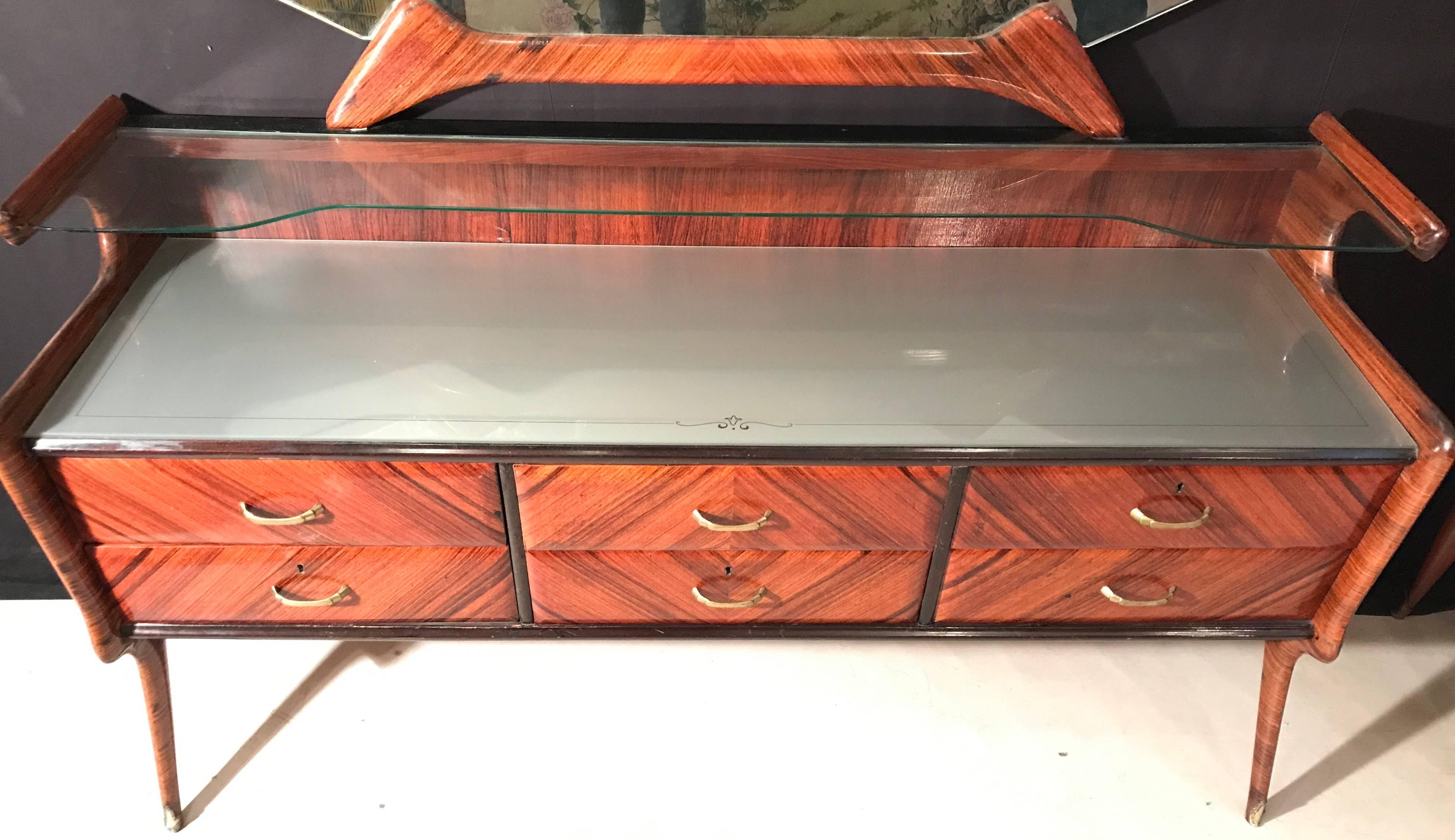 With six drawers . Gray painted glass top.