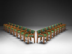 Elegante juego italiano de mediados de siglo de dieciséis sillas de comedor con armazón curvado