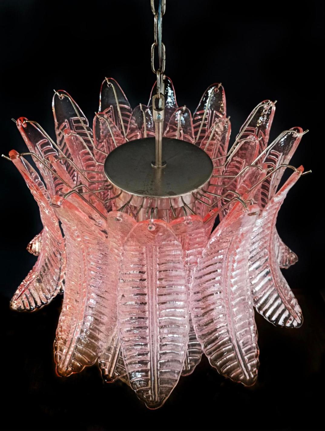 Beautiful Italian Murano chandelier composed by 36 splendid pink glasses that give a very elegant look. The glasses of this chandelier are real works of art.
Period: 1980s
Dimensions: 47.25 inches (120 cm) height with chain; 21.65 inches (55 cm)