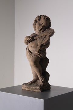 Elegant Italian musical cherub statue in stone for the garden