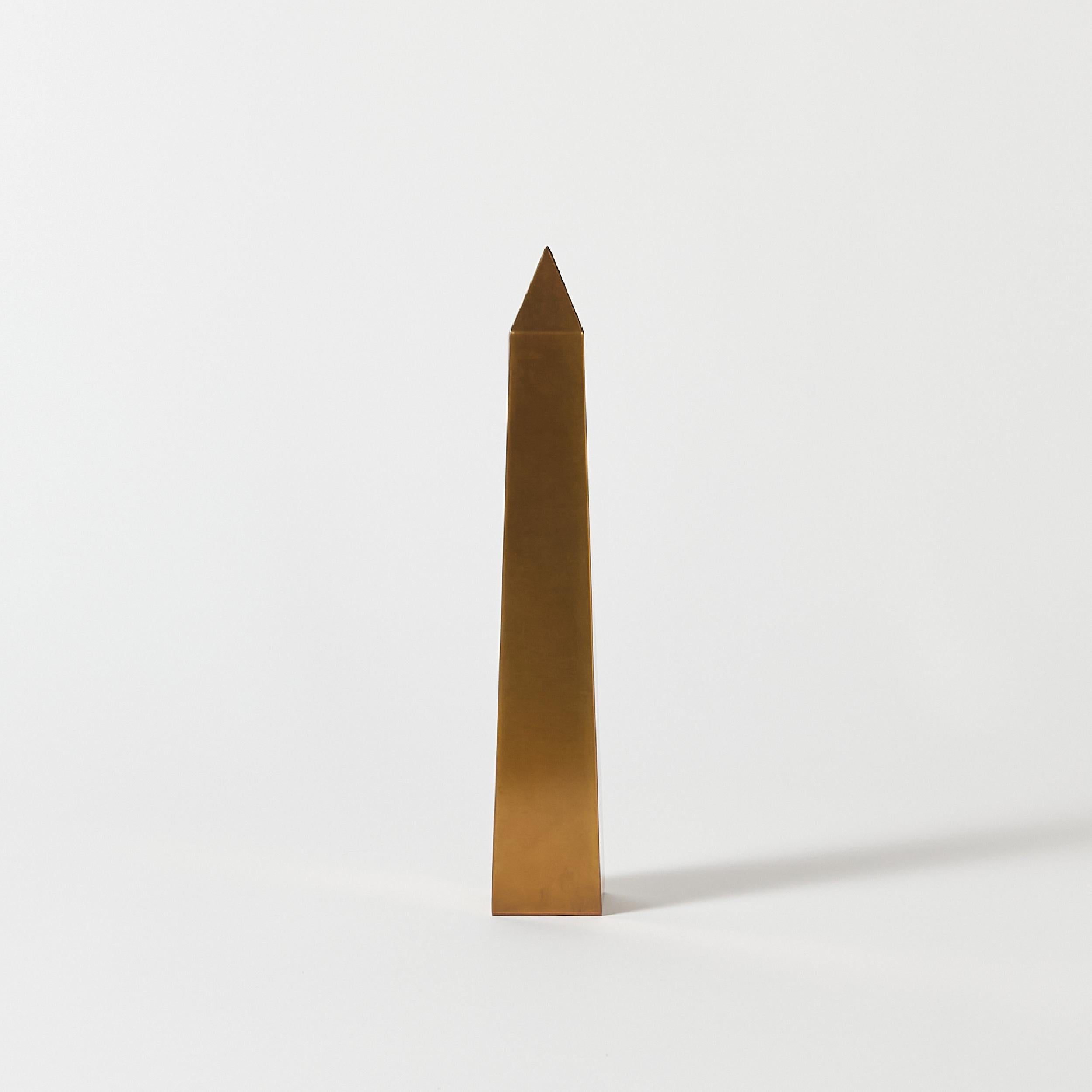 Bronze obelisk with elegant proportions, stamped 