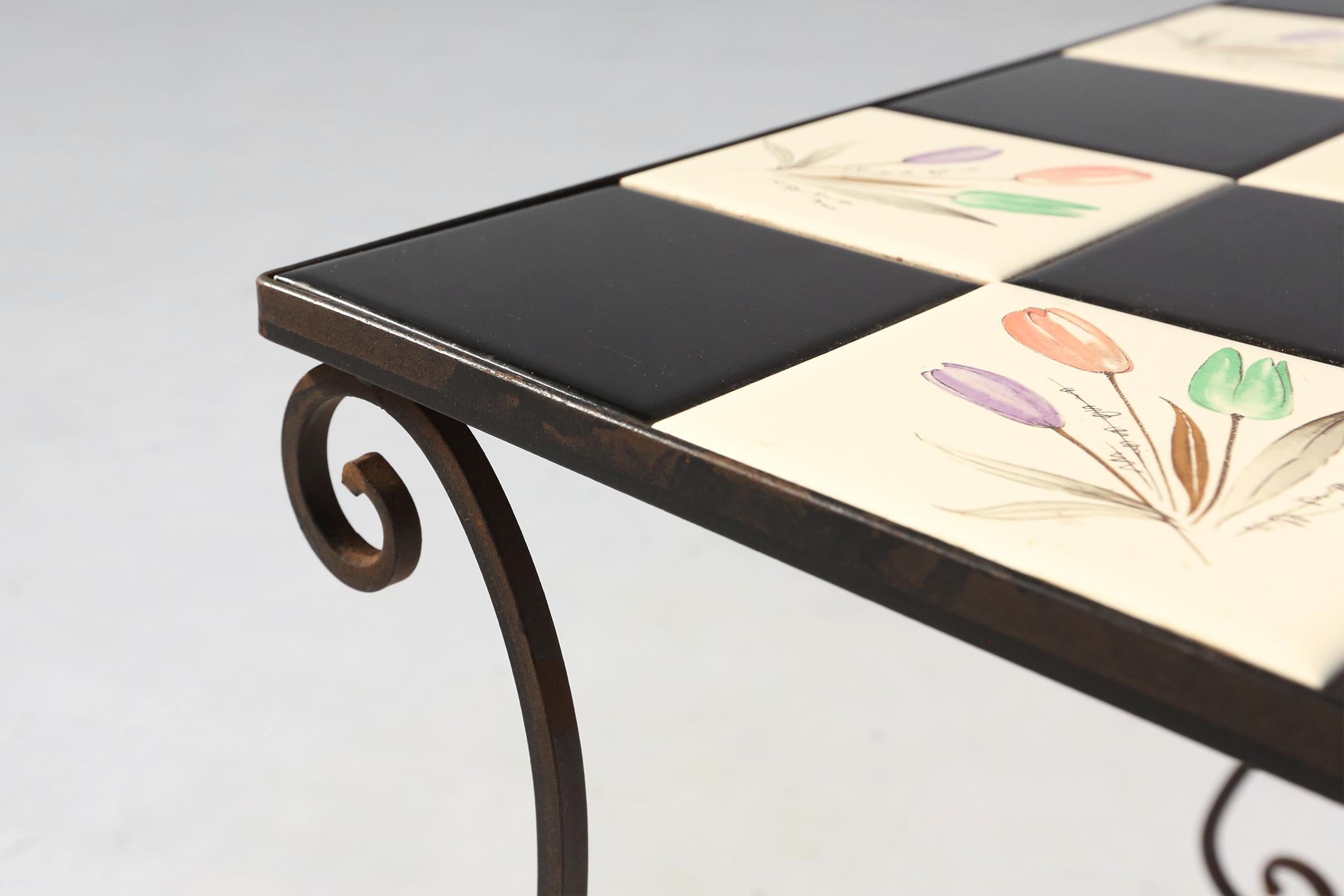Elegant Italian side table with wrought iron base and decorated ceramic tales, 1 For Sale 1