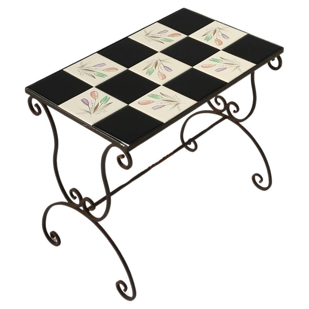 Elegant Italian side table with wrought iron base and decorated ceramic tales, 1 For Sale