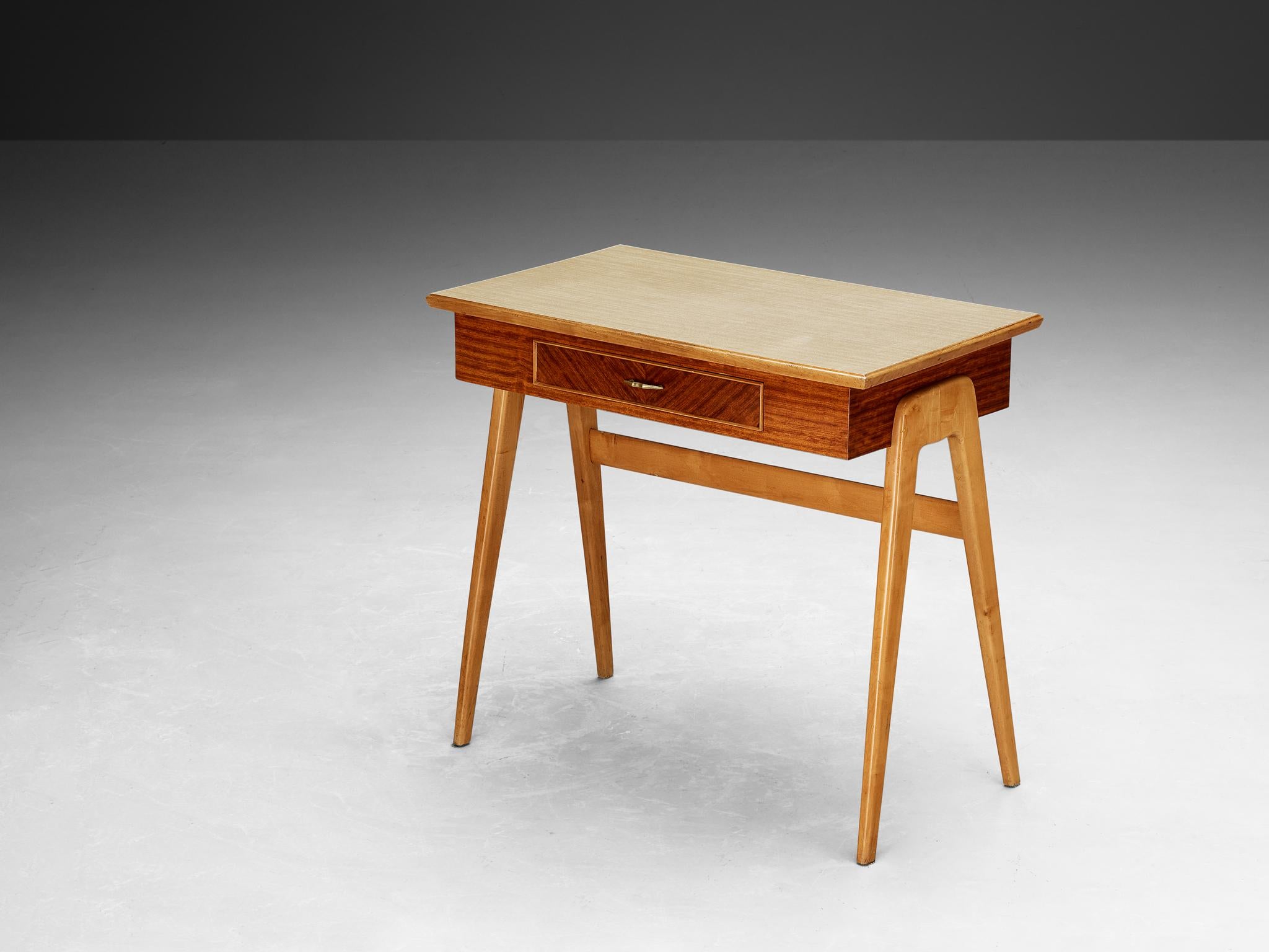 Writing desk, cherry, mahogany, brass, formica, Italy, 1950s

Very elegant desk made in Italy in the 1950s. The framework is executed in cherry. The upper part of this piece is made from mahogany veneer, and the top is inlayed with a very practical