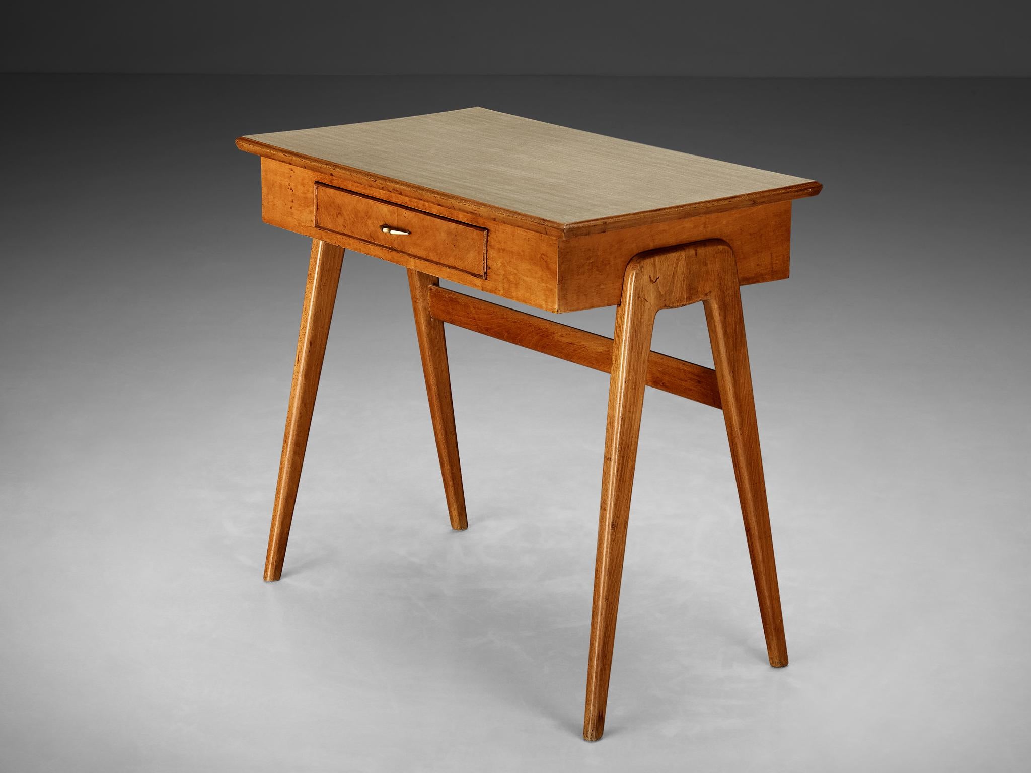Writing desk, cherry, brass, beech, formica, Italy, 1950s

Very elegant desk made in Italy in the 1950s. The framework is executed in cherry. The upper part of this piece is made from cherry veneer, and the top is inlayed with a very practical