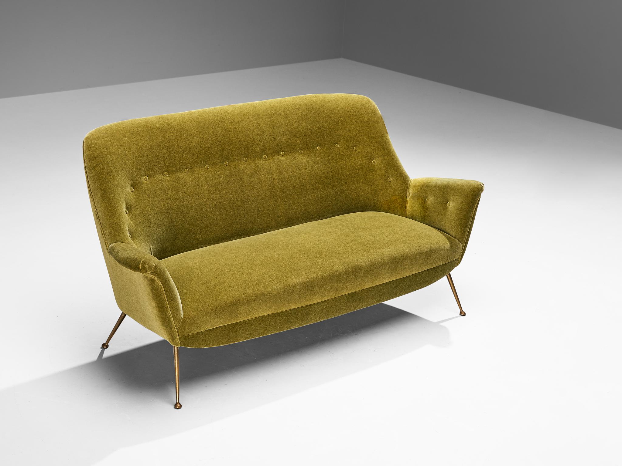 Sofa, velvet, brass, Italy, 1950s

This gorgeous sofa is an iconic example of Italian design from the 1950s. Organic and sculptural, this sofa is anything but minimalistic. Equipped with stiletto brass feet which are narrow conically tapered and,