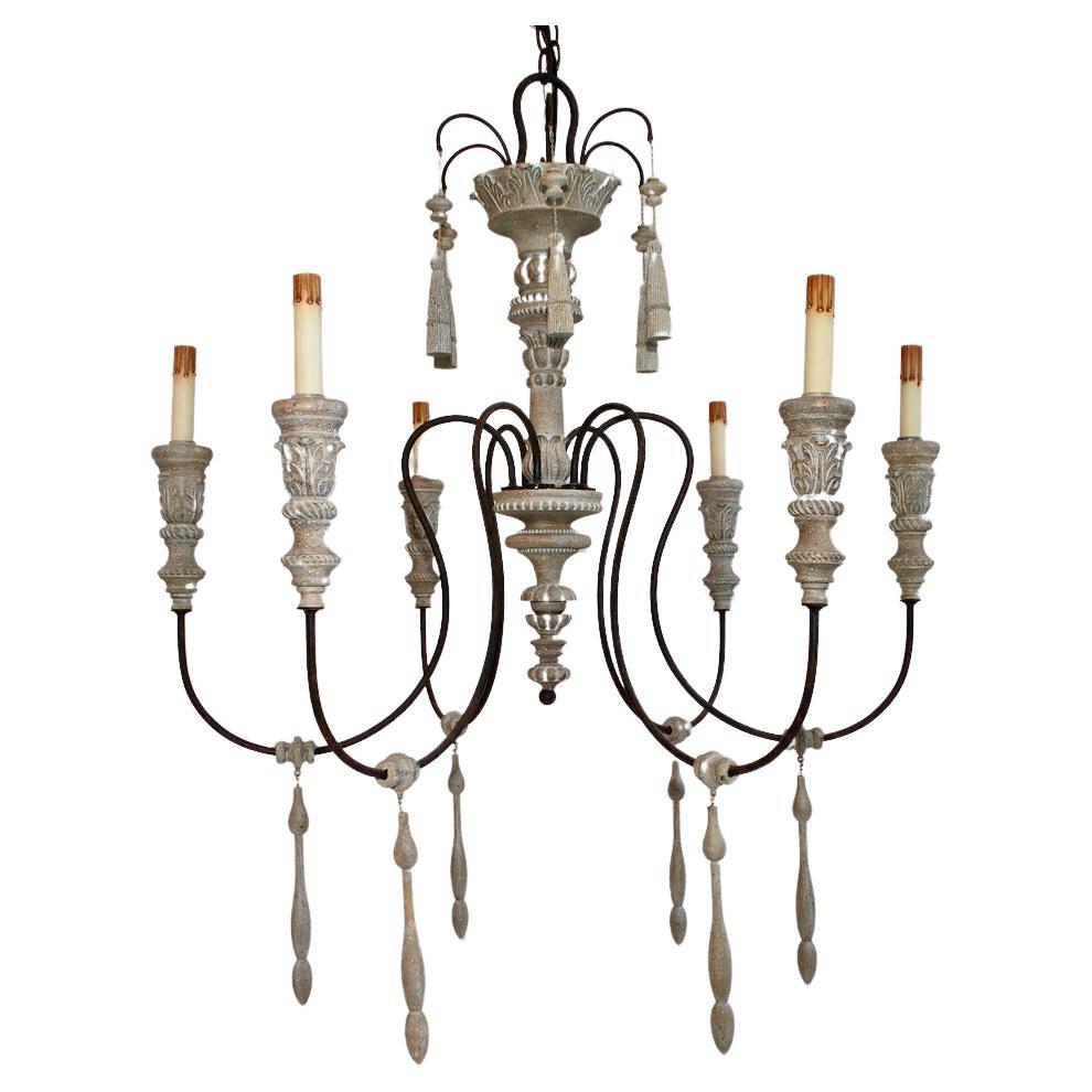 Pair of Italian Ebonized Wood and Iron Chandeliers at 1stDibs