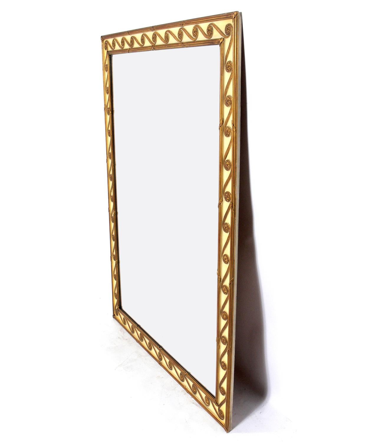Elegant ivory and gilt mirror, probably French, circa 1940s. Retains warm original patina.