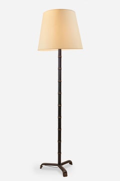 Elegant lampadaire de style Jacques Adnet en faux métal bambou et cuir, France