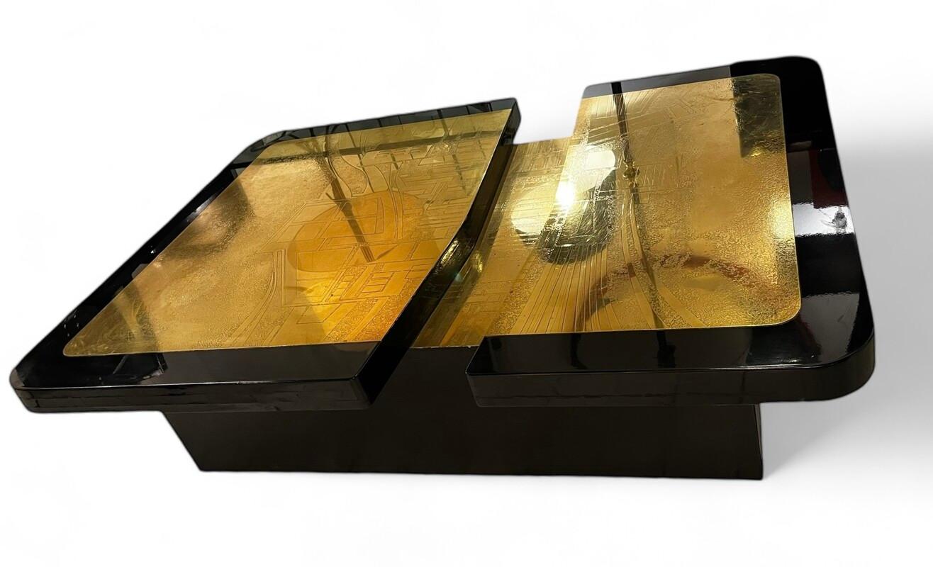 
Unusual black lacquer low resin table with a profusely engraved brass top.
The table top is made up of three separate parts resting on a black lacquer wood base.
Belgium school in the style of Armand Jonckers and Willy Daro.
Signed