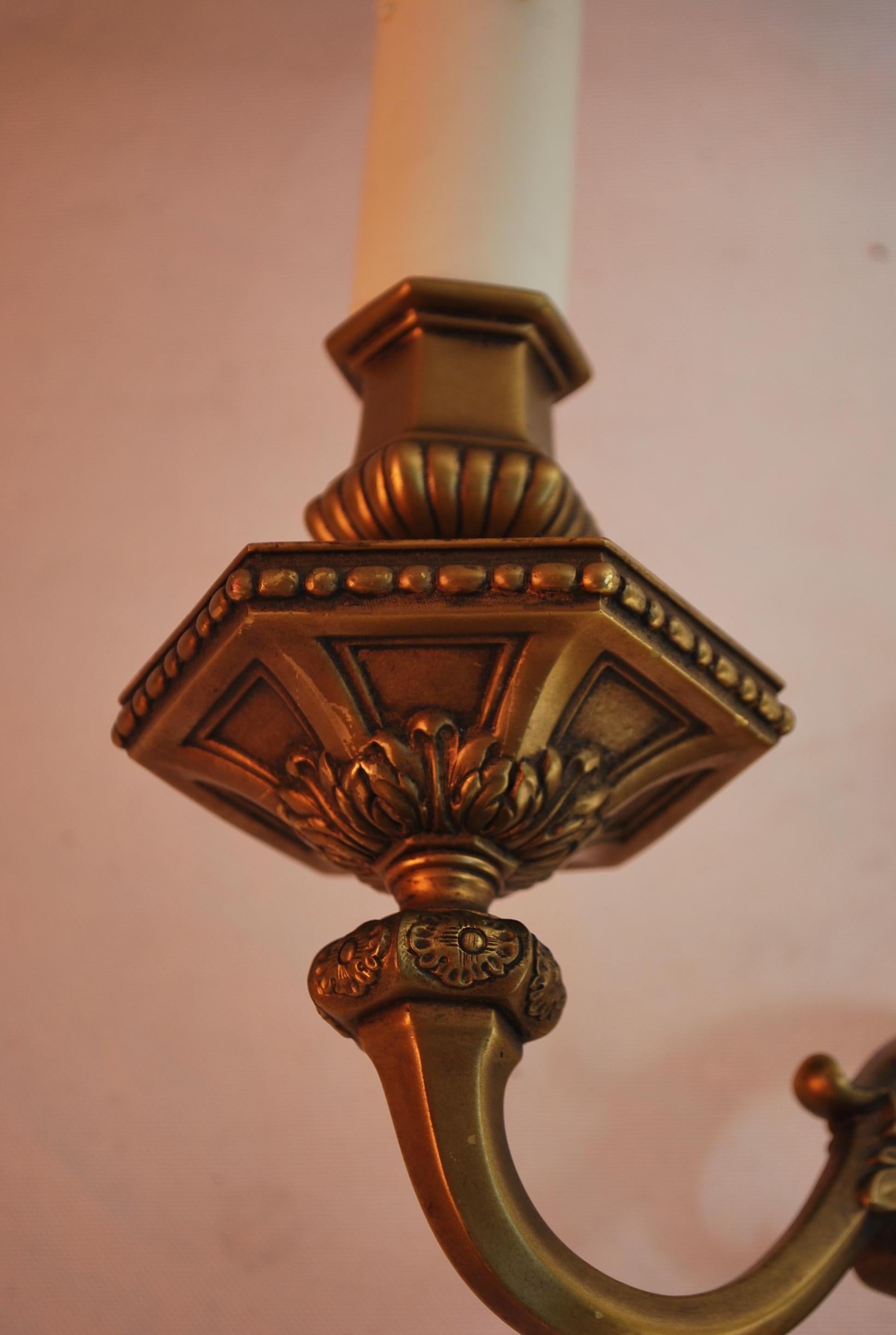Brass Elegant large 1920's brass sconces For Sale