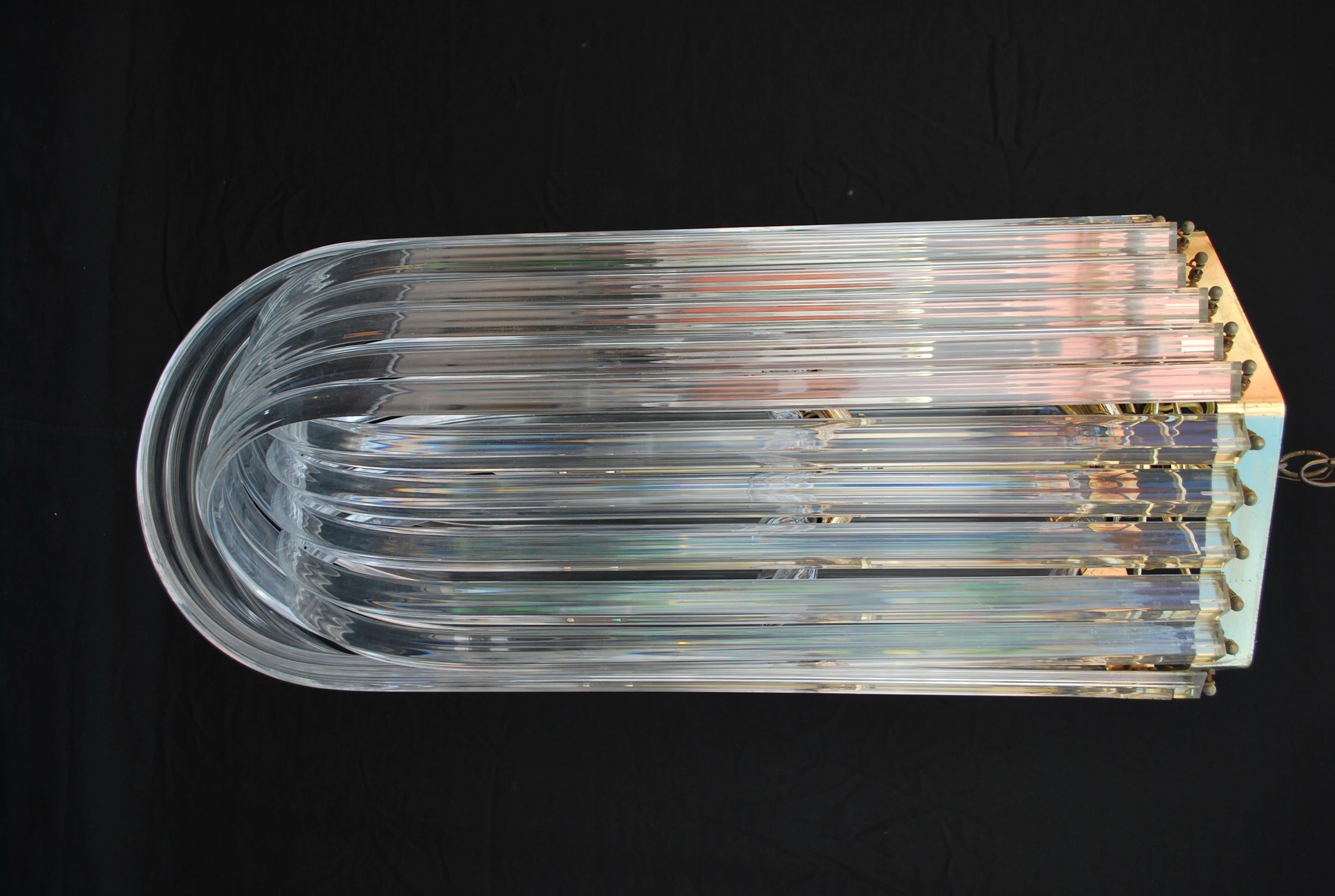 A beautiful and large lucite light, that size is unusual, I love this light, I try to put it in my house but could not find a place, you need high ceiling.