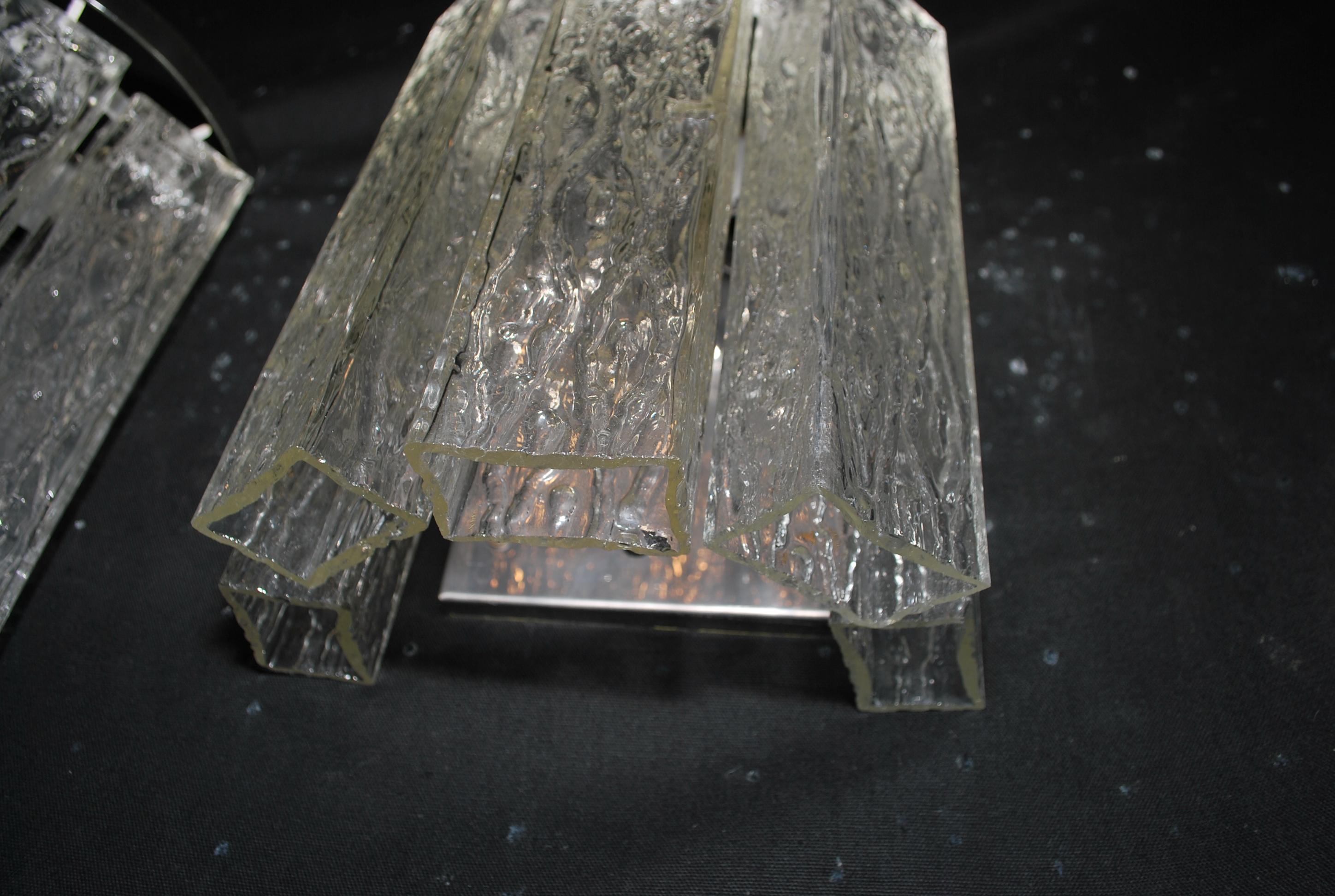 A beautiful  and elegant pair  of 1970's sconces with hands blown Murano glass, the glass is much nicer in person