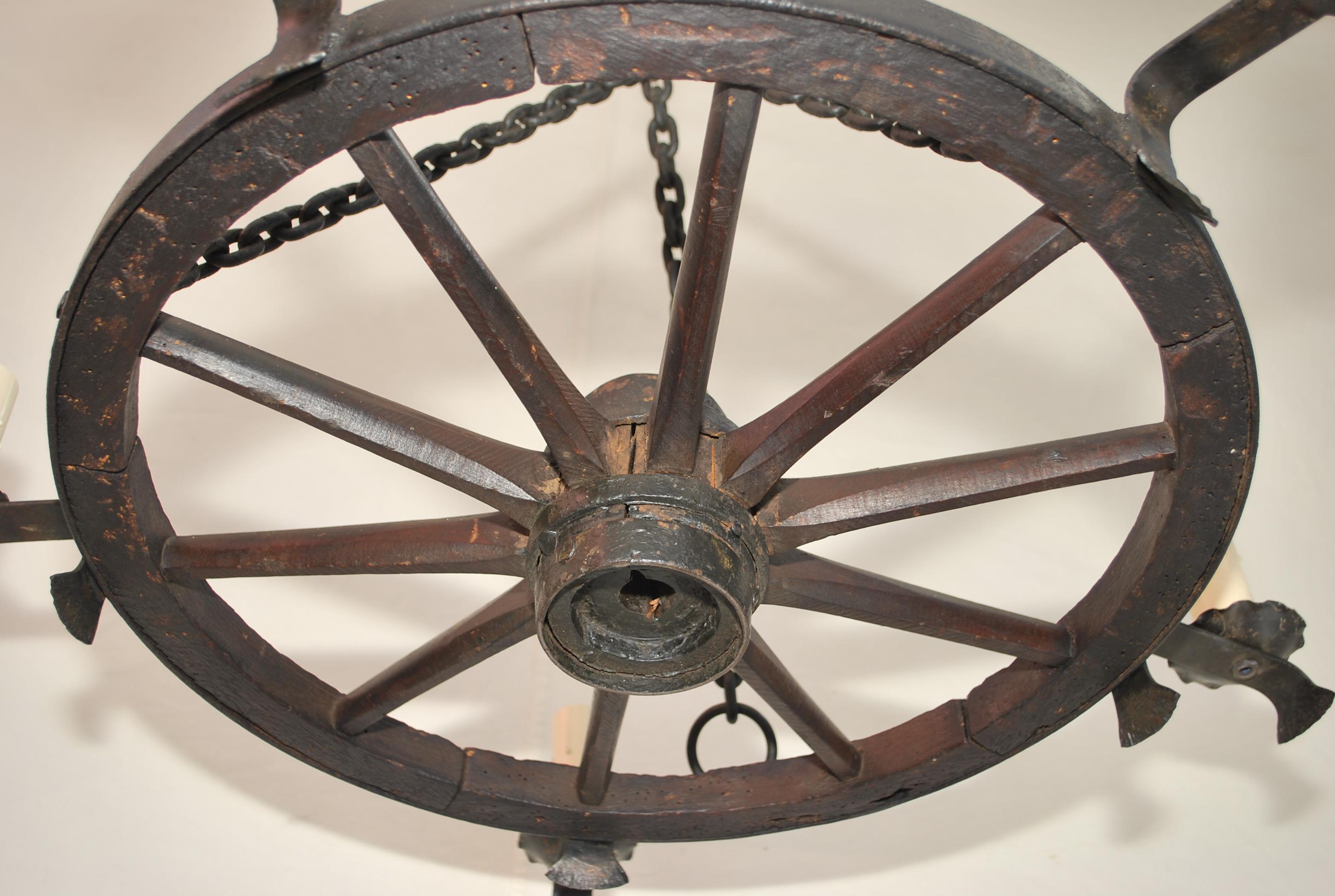 Rustic Elegant Late 19th Century Wagon Wheel Chandelier For Sale