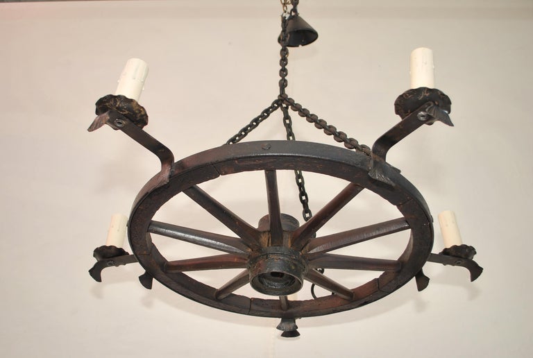 Antique wagon top wheel chandelier
