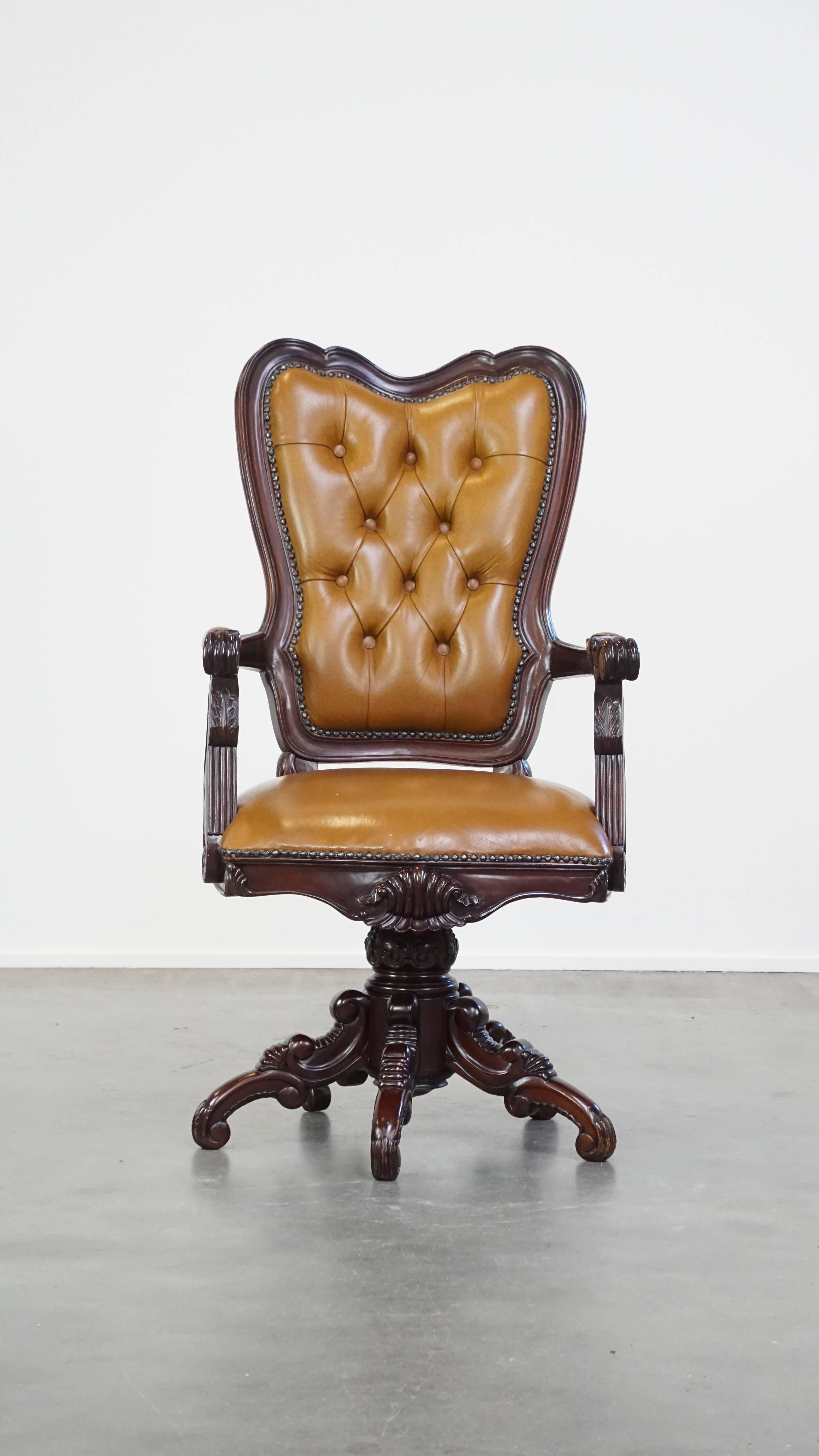 A true eye-catcher cowhide leather office chair is a unique piece. It features a high back and beautiful wooden accents, making it suitable for almost any space while adding a touch of bold character.

This chair has a fixed seat cushion and offers