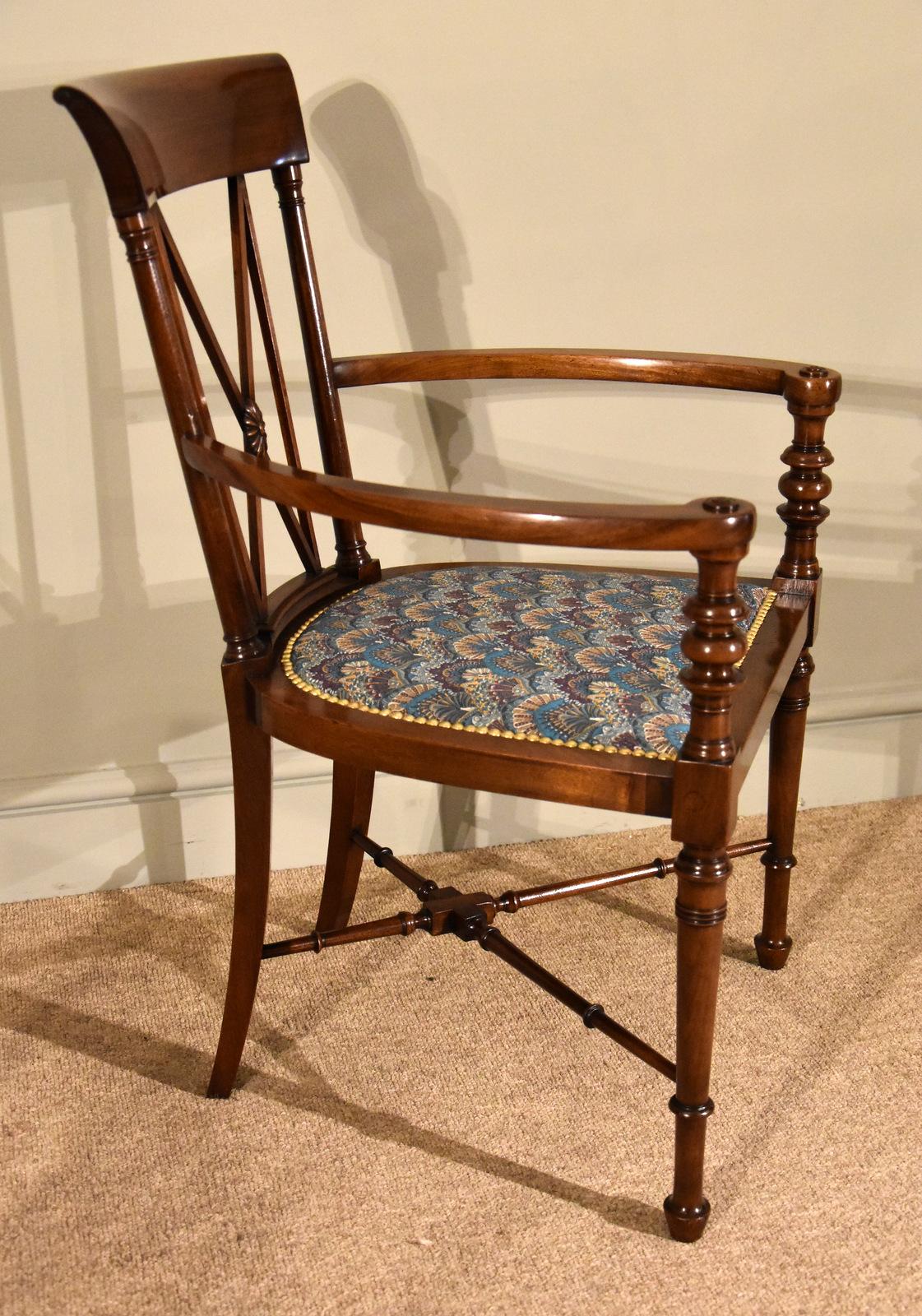 A fine quality turn of the century Liberty stamped armchair covered in Liberty fabric

Dimensions 
Height 34