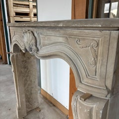 Elegant Limestone Mantel, Parisian Louis XV Style, Hand-Crafted Design