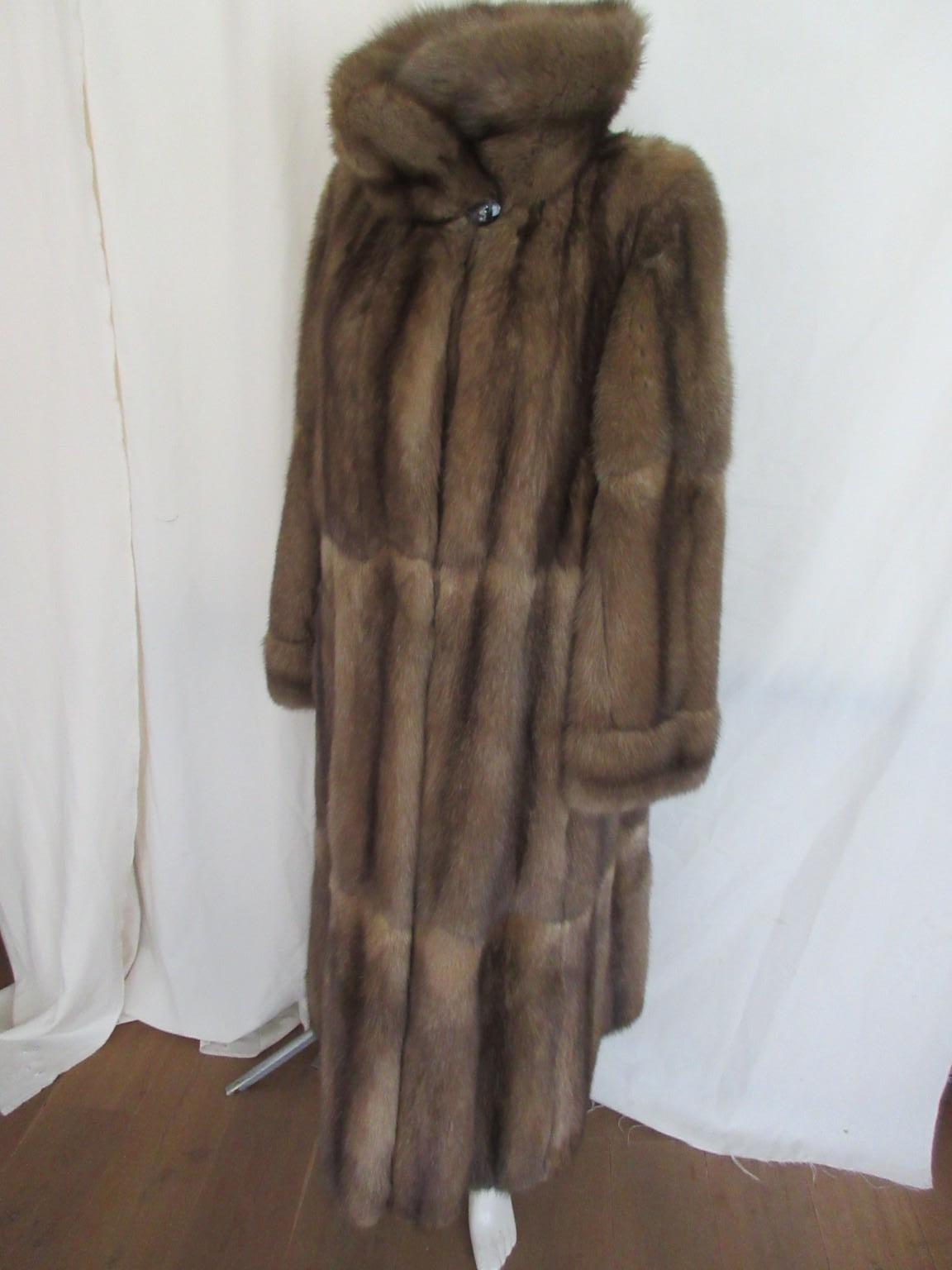 Brown high end scallop design luxurious full lenght sable fur coat 

We offer more exclusive fur items, view our frontstore.

Details:
Soft natural Russian sable fur, which it's very easy to wear 
In natural brown color
with 2 side pockets 
1 inside