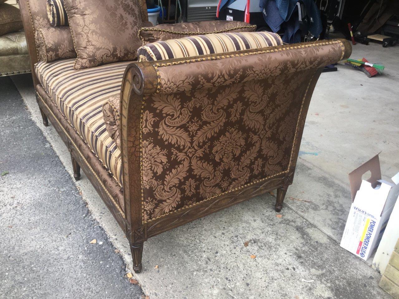 A gorgeous elegant daybed settee by Heritage Drexel with French style upholstered in a combination chocolate silk damask and a coordinating silk and velvet stripe. The frame features a crackled finish, fluted legs, and a subtle carving at the