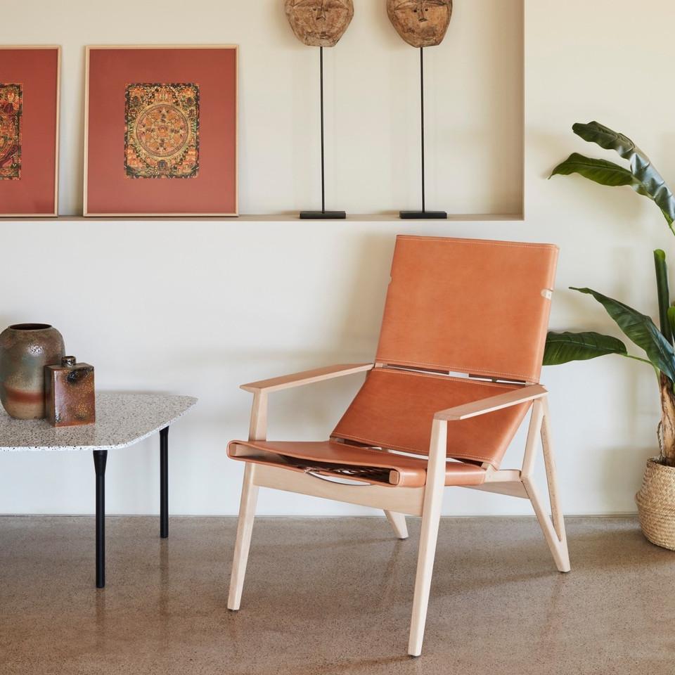 Wood Elegant Lounge Chair with Handcrafted Leather Upholstery For Sale