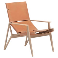 Elegant Lounge Chair with Handcrafted Leather Upholstery