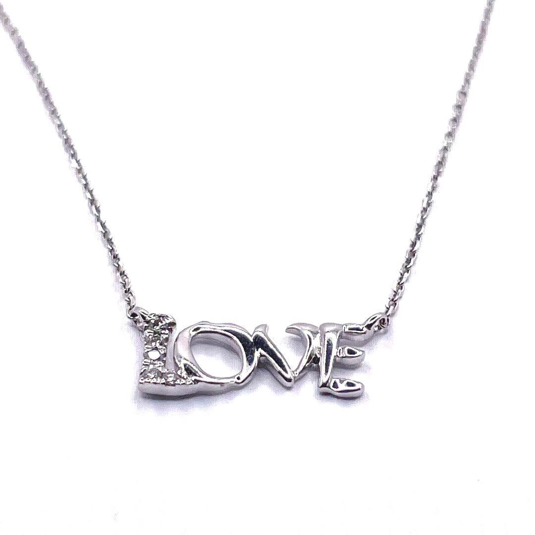 This elegant pendant necklace features a beautiful scripted 