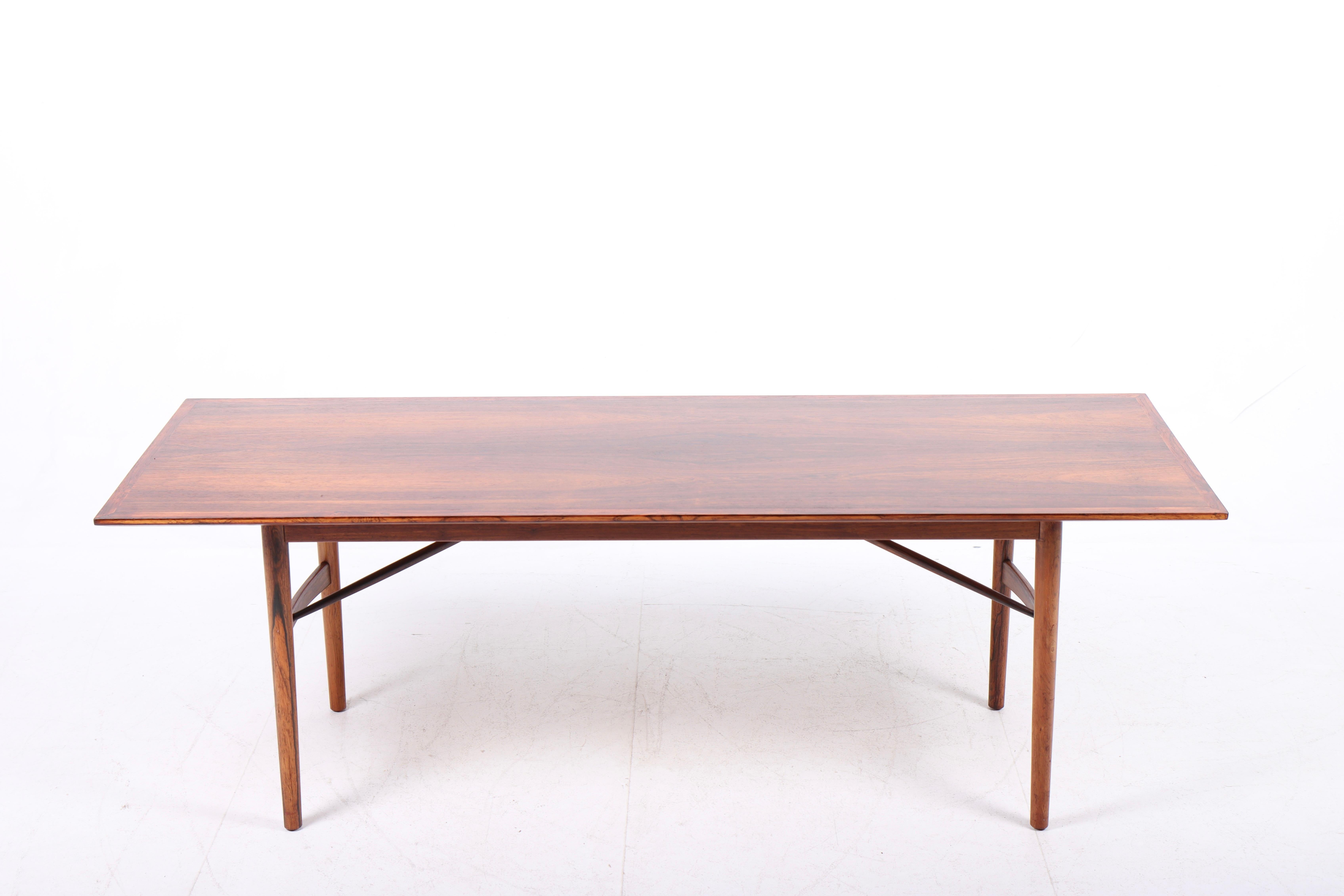 Low table in rosewood, designed by Steffen Syrach Larsen for cabinetmaker Gustav Bertelsen. Great original condition.

 