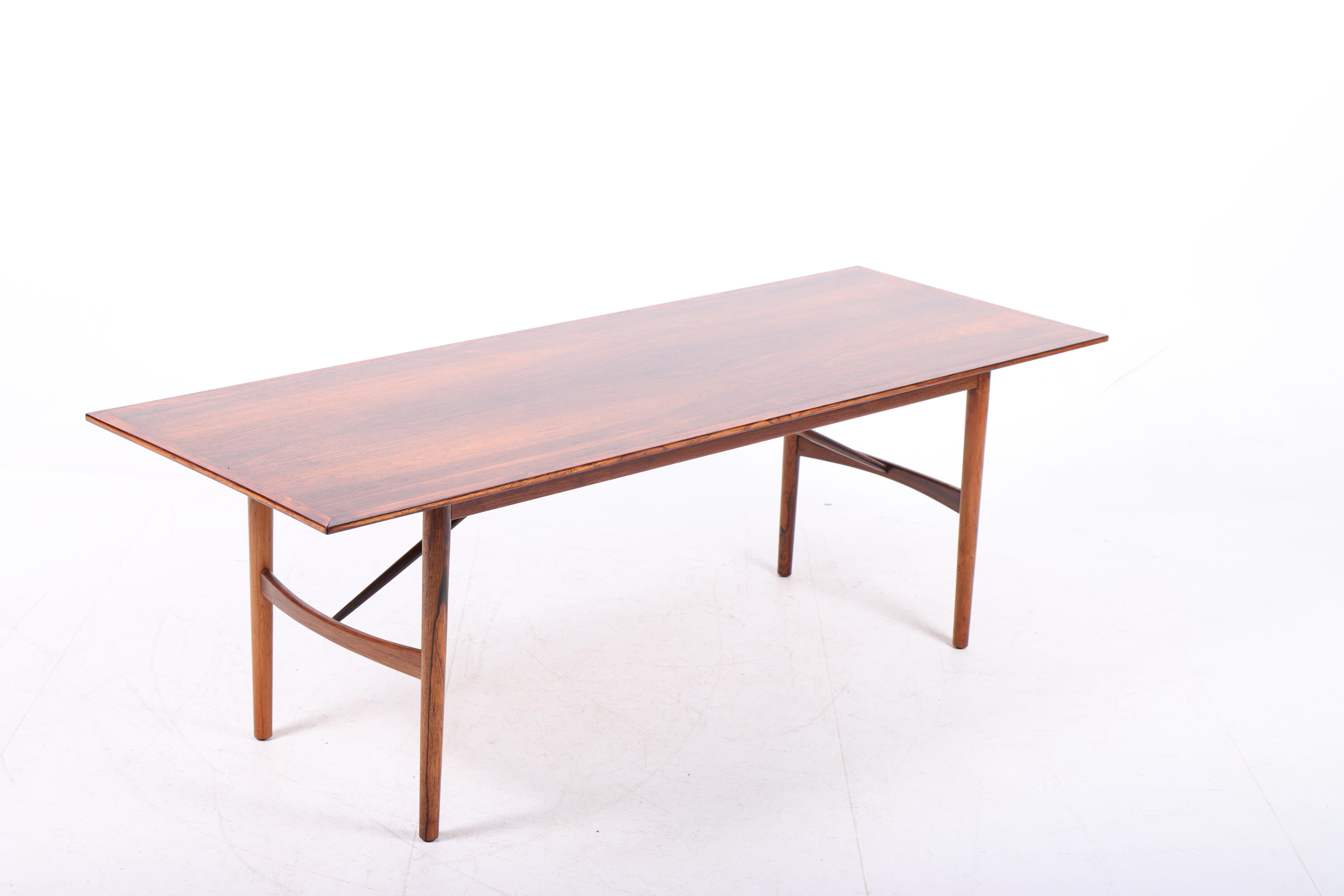 Scandinavian Modern Elegant Low Table in Rosewood by Steffen Syrach Larsen, 1950s For Sale