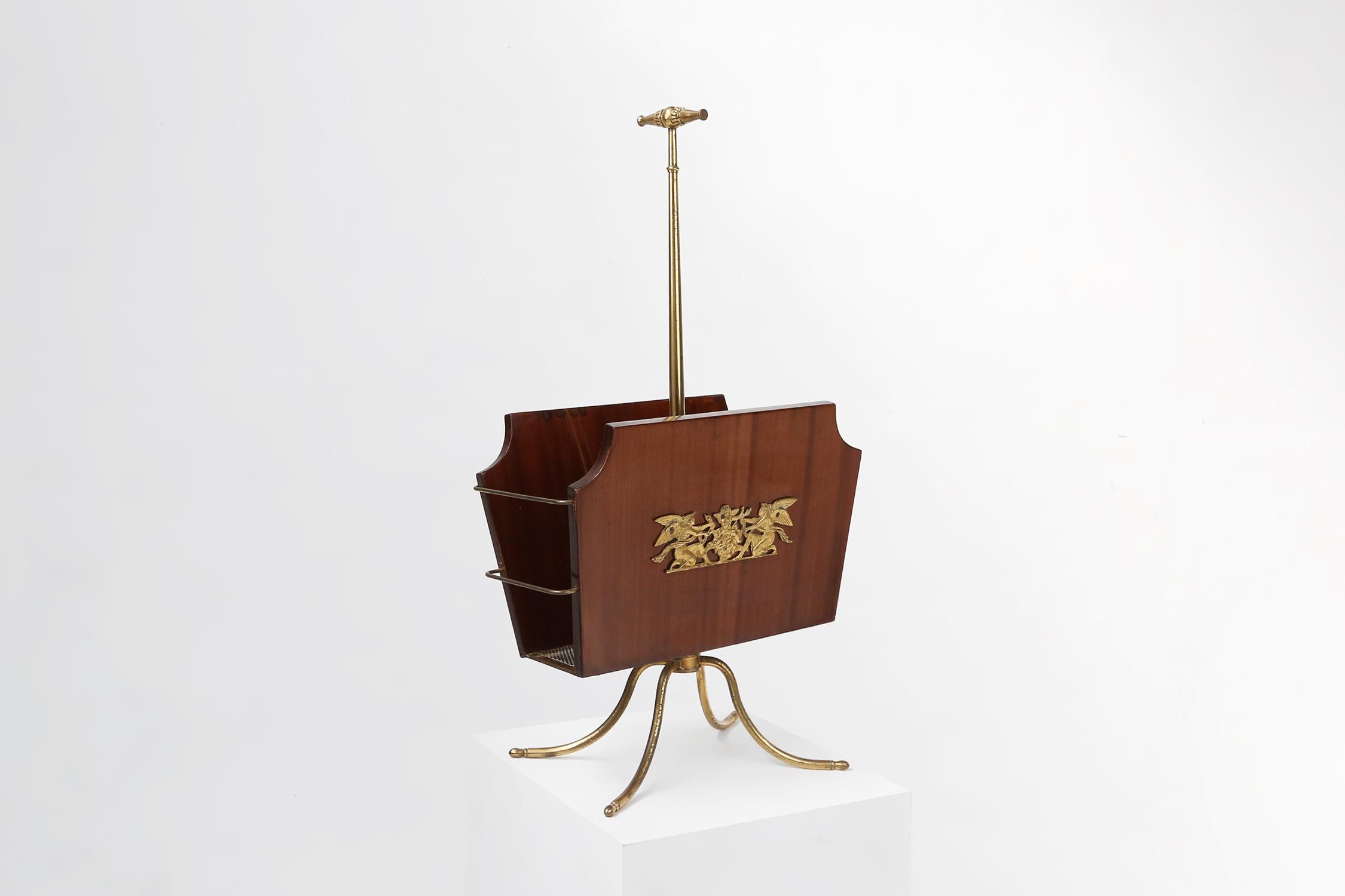 Mid-Century Modern Elegant magazine rack with messing decorations and feet, France ca. 1950 For Sale