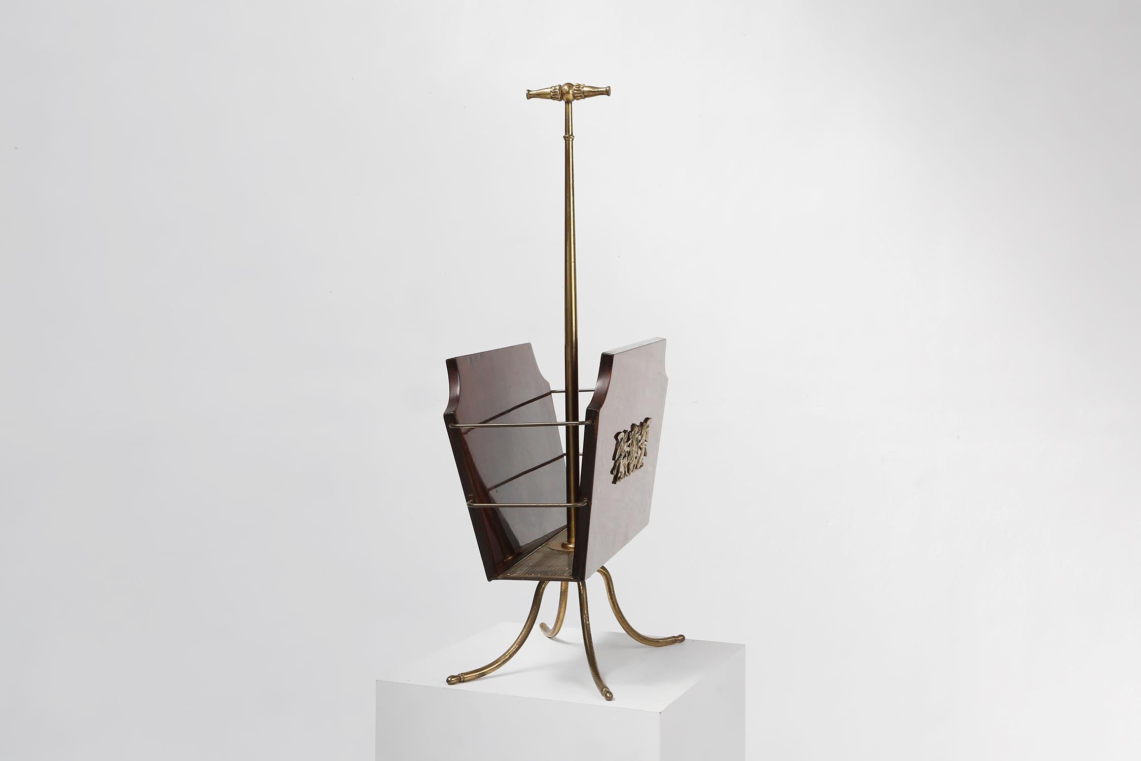 French Elegant magazine rack with messing decorations and feet, France ca. 1950 For Sale