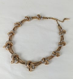 Elegant Marcel Boucher Gold and Pave Knot Necklace