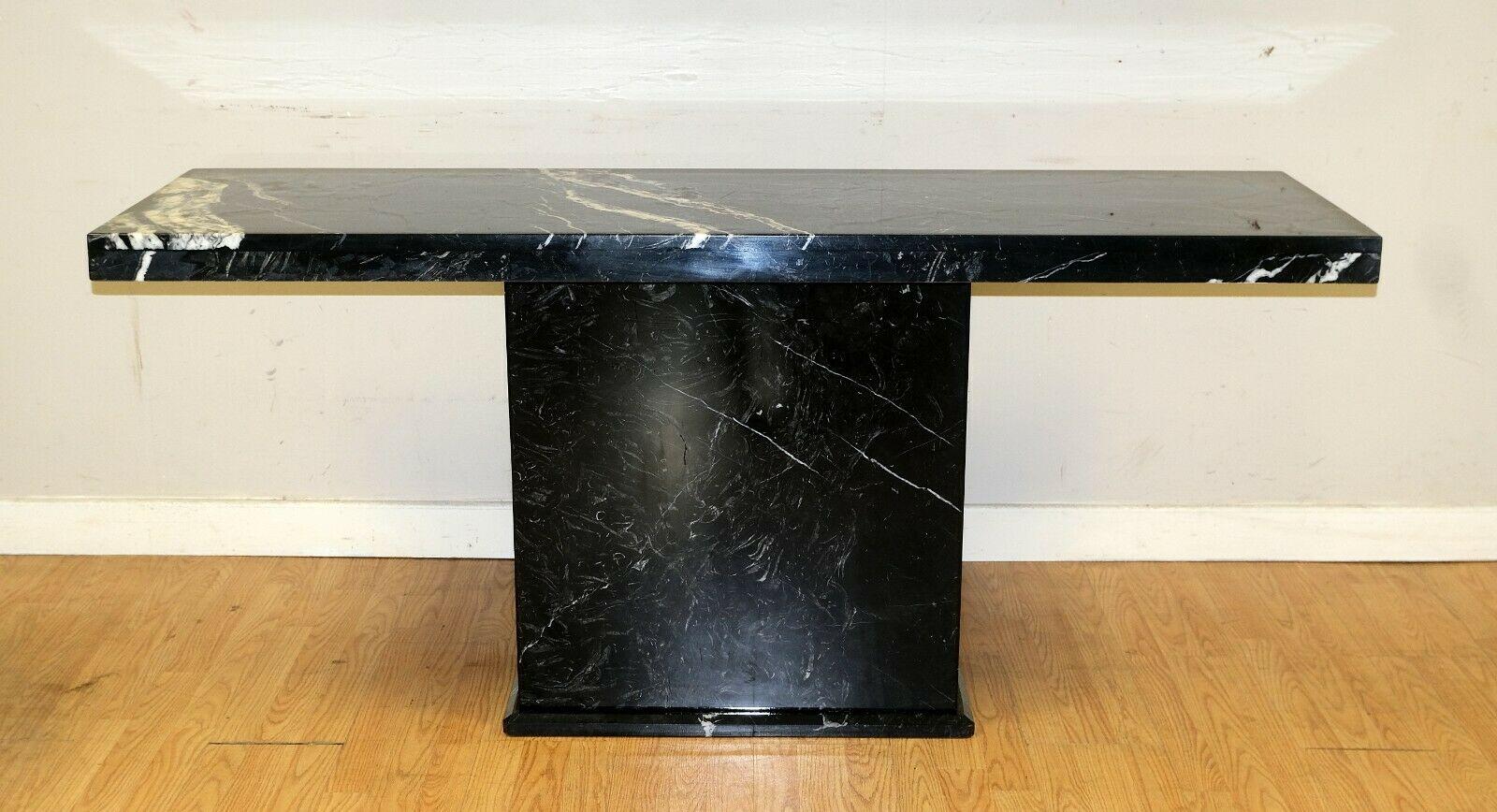 We are delighted to offer for sale this stunning Marquina marble black and white console table.

This exquisite console table will add style and glamour, creating a beautiful focal point to your home. The sublime appearance can be used as a stage