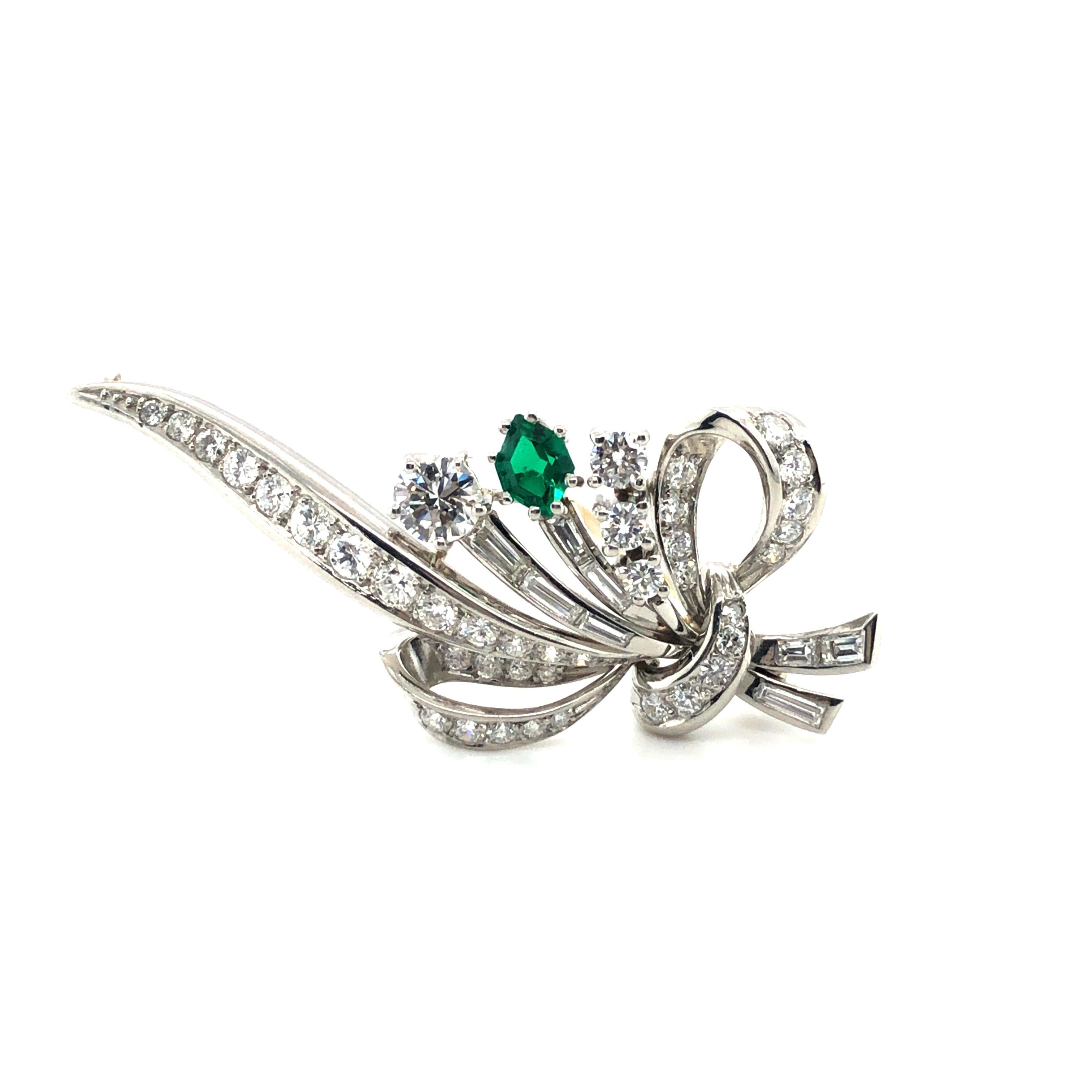 The well-known Swiss jeweller Meister (Zurich) made this elegant bouquet in Platinum 950 tied together by a delicate bow. He actually makes the very classic, very modern. The gem quality emerald of 0.80 ct stands out because of its special cut, the