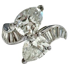 Elegant Mid-20th Century Bypass Ring of E Color VS1 Clarity Pear Shape Diamonds