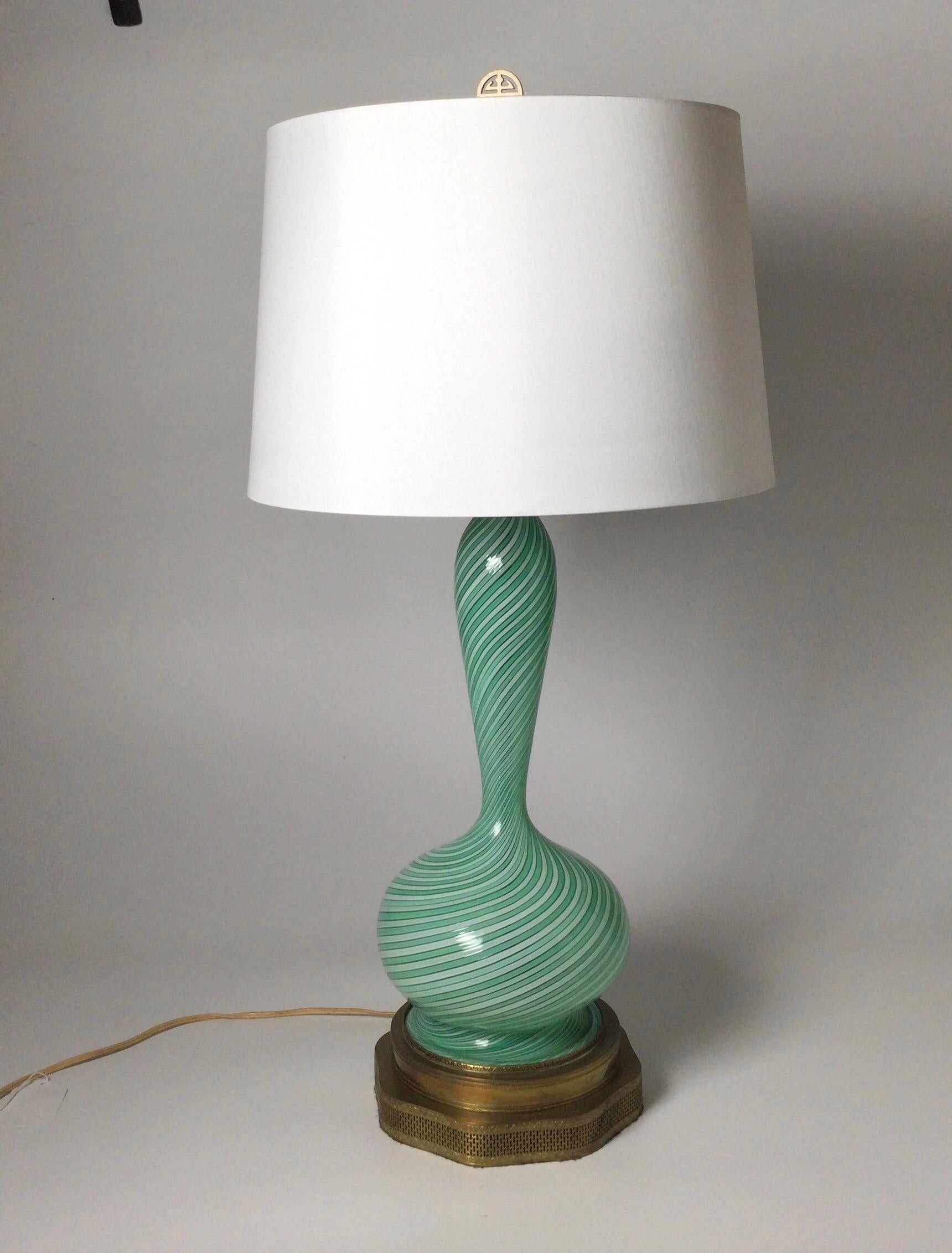 Elegant Aqua and white Murano hand blown lamp with pierced brass base. The gourd form with custom base with newer wiring.. The shade is for photographic purposes only and not included.