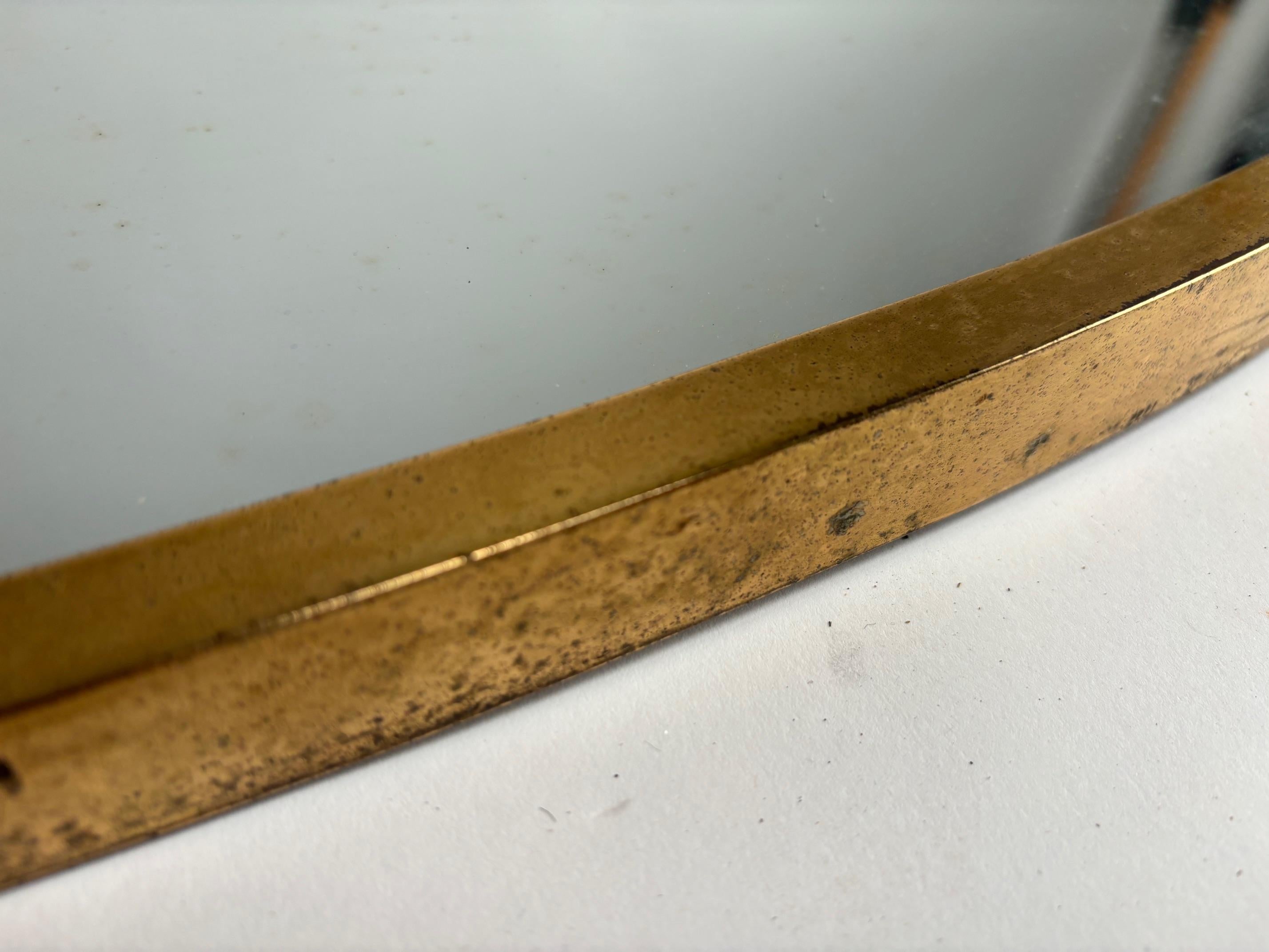Mid-20th Century Elegant Mid-Century Brass wall mirror, Gio Ponti Style, Italy For Sale