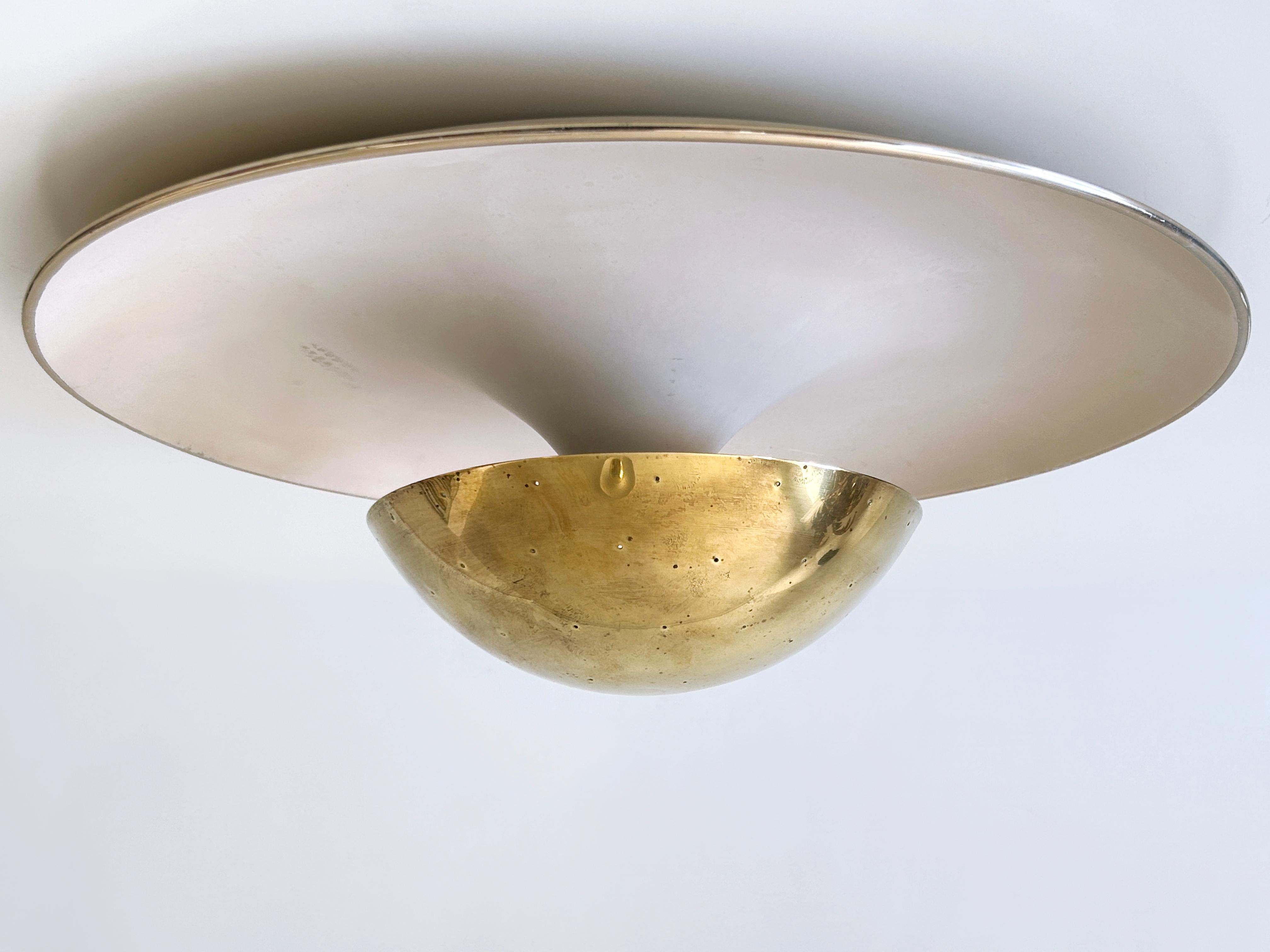 Extremely rare, large and elegant Mid-Century Modern flush mount or sconce in style of Gino Sarfatti Model #155. With perforated brass diffusor. This is a very impressive and decorative piece of German design. Designed 1954 and manufactured by Bünte