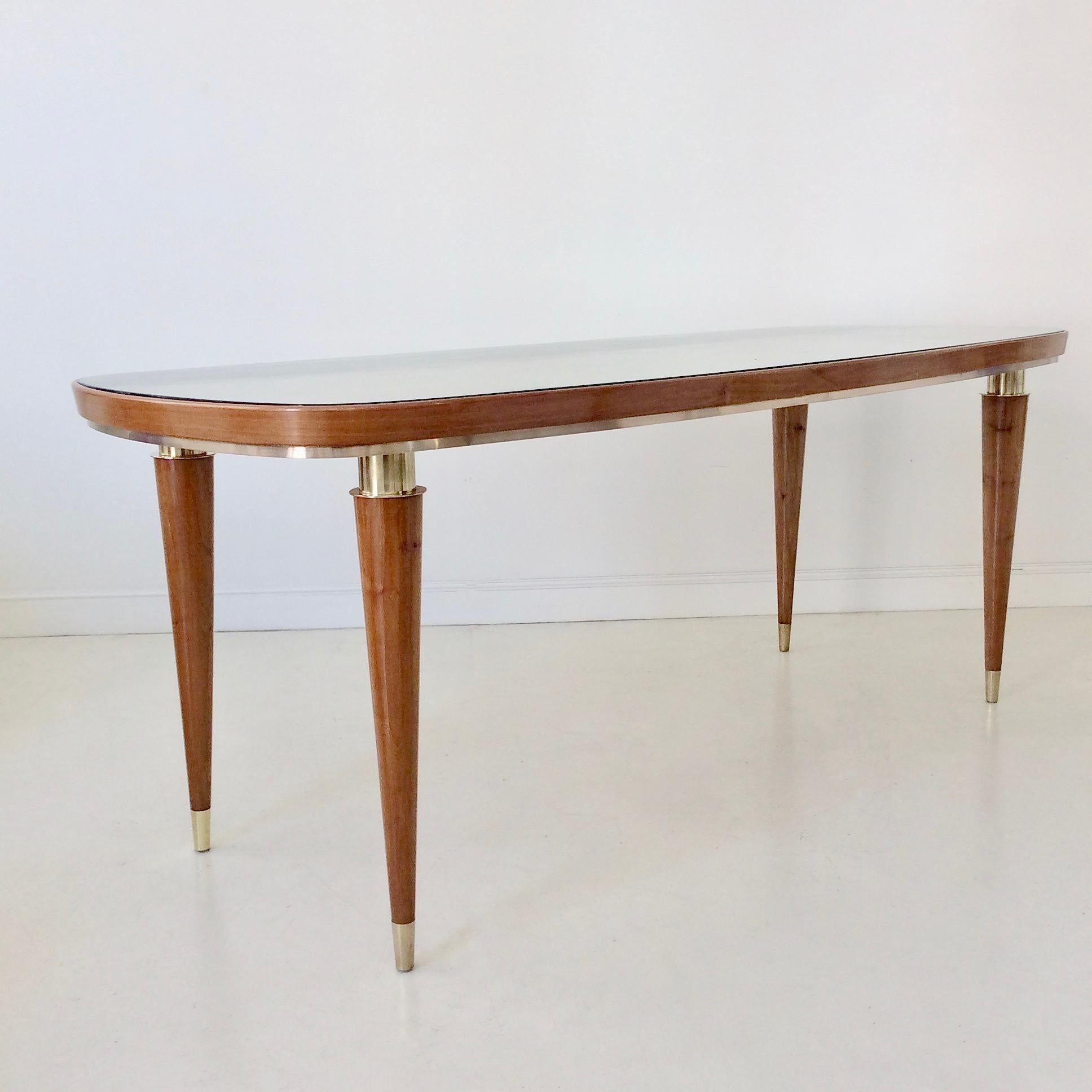 Very elegant midcentury console table, circa 1950, Italy.
Large light wood top, covered with original glass.
Wood legs, finished brass details.
Dimensions: 200 cm W, 84 cm D, 80 cm H.
Good original condition.
 









Paolo Buffa,