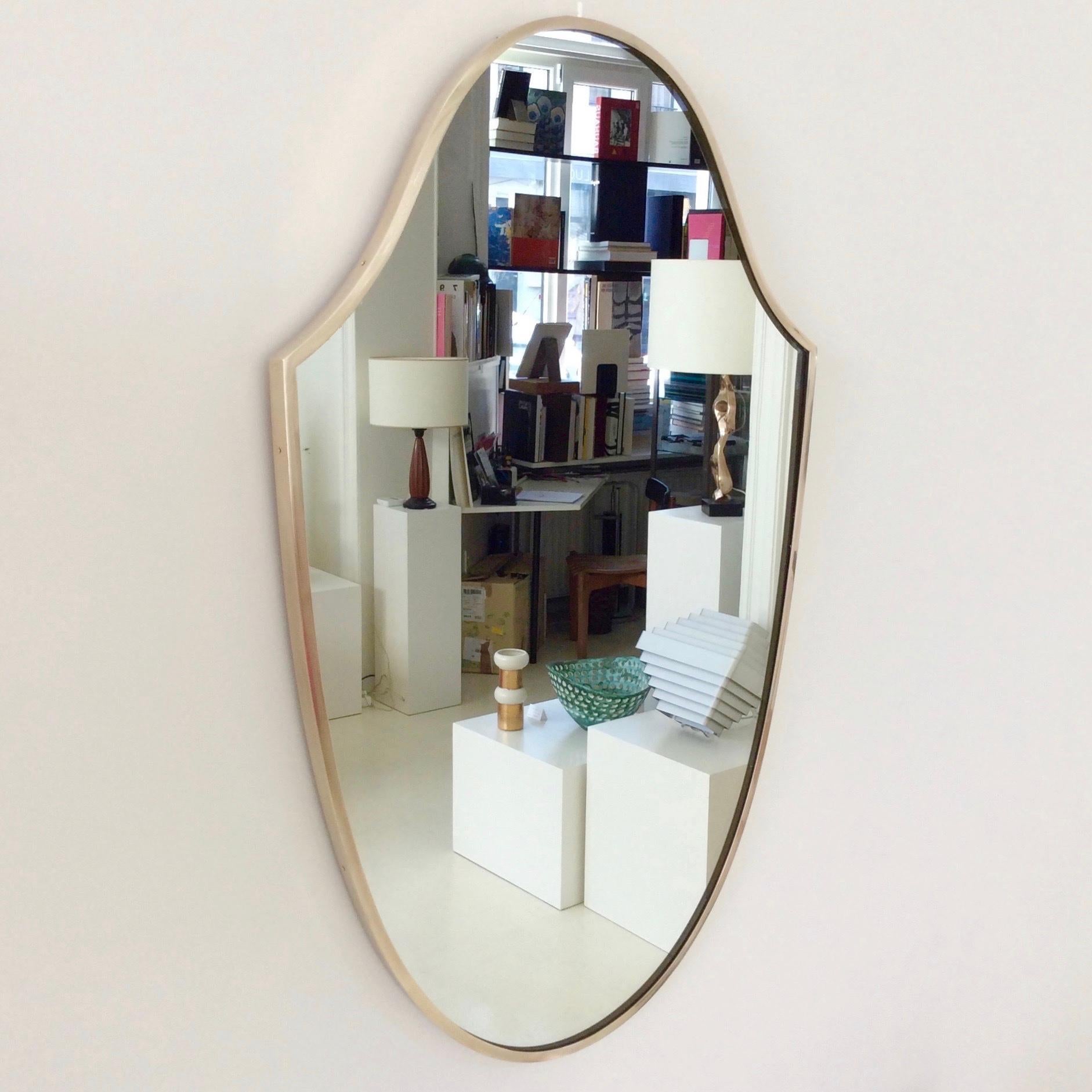 Elegant mid-century mirror, circa 1950, Italy.
Polished brass.
Dimensions: 81 cm W, 52 cm H, 3 cm D.
Good original condition.
All purchases are covered by our Buyer Protection Guarantee.
This item can be returned within 14 days of delivery.
  