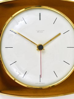 Junghans Ato-Mat Gold- und Messing-Wanduhr aus der Jahrhundertmitte, Deutschland, 1950er Jahre