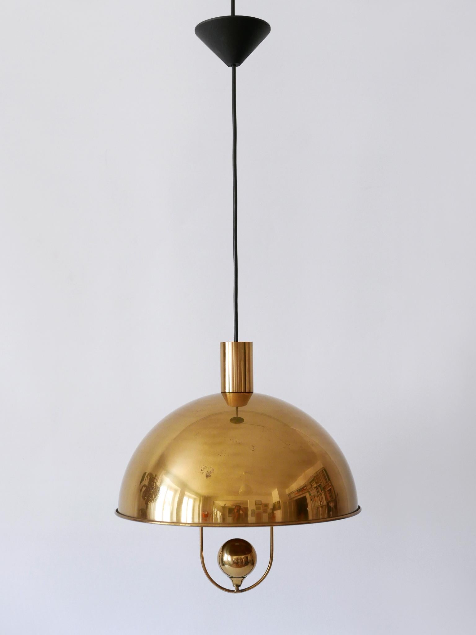 Elegant Mid-Century Modern Brass Pendant Lamp by Florian Schulz Germany 1970s In Good Condition For Sale In Munich, DE