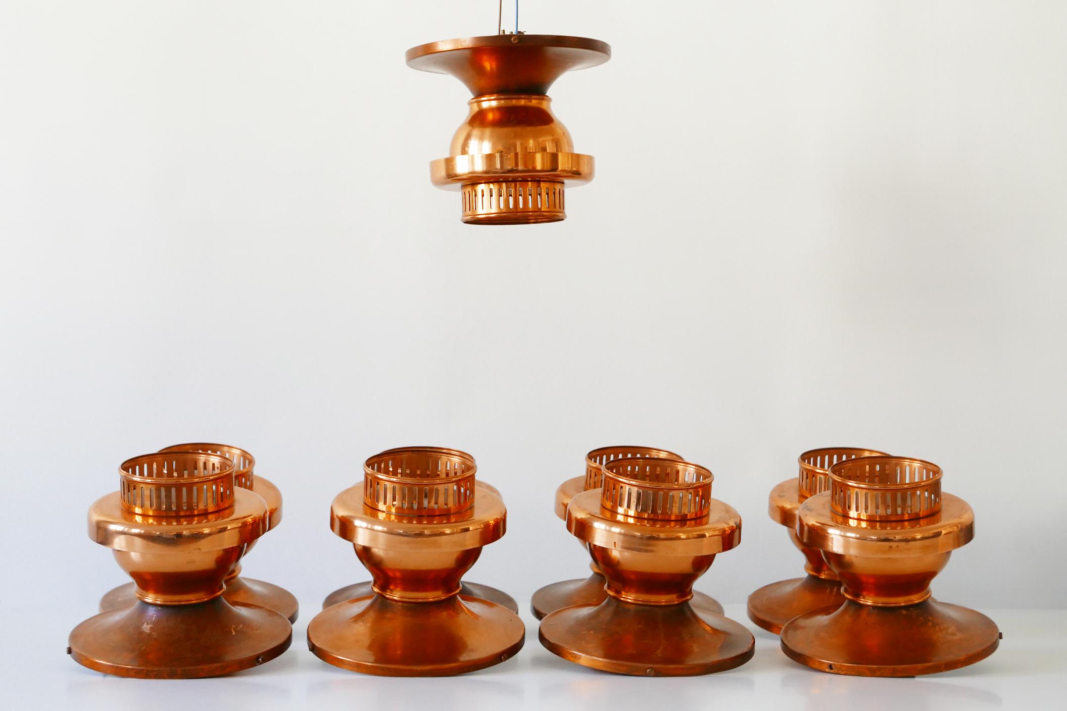 Elegant Mid-Century Modern copper ceiling lamps. Designed and manufactured probably in 1960s, Denmark. 

Nine identical lamps available!

Executed in copper sheet, each lamp comes with 1 x E27 / E26 Edison screw fit bulb holder, is rewired and