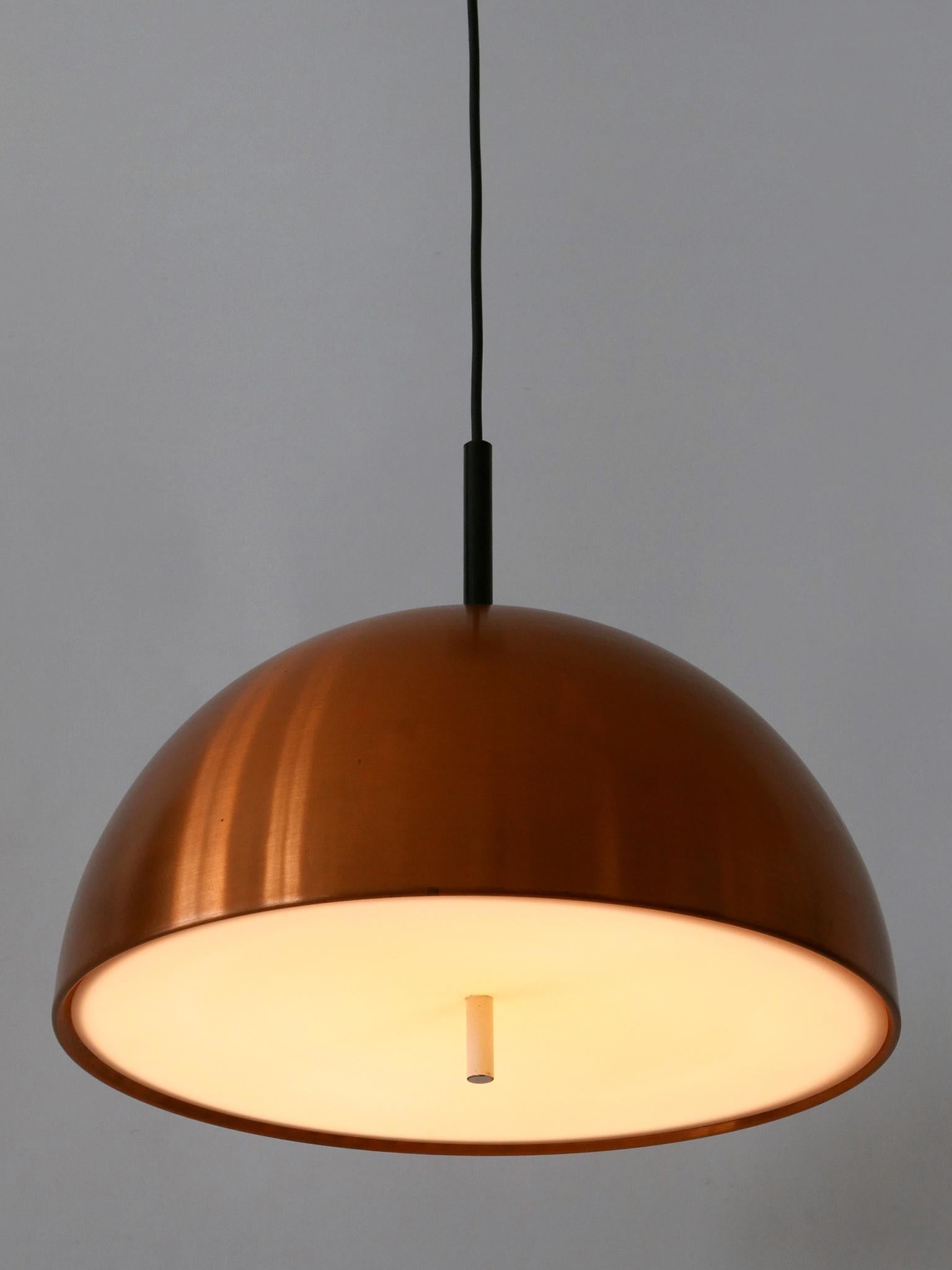 Minimalistic and elegant Mid-Century Modern copper pendant lamp or hanging light. Designed and manufactured by Staff & Schwarz Leuchtenwerke, Germany, 1960s.

Executed in copper sheet and plexiglass, the pendant lamp needs 2 x E27 / E26 Edison screw