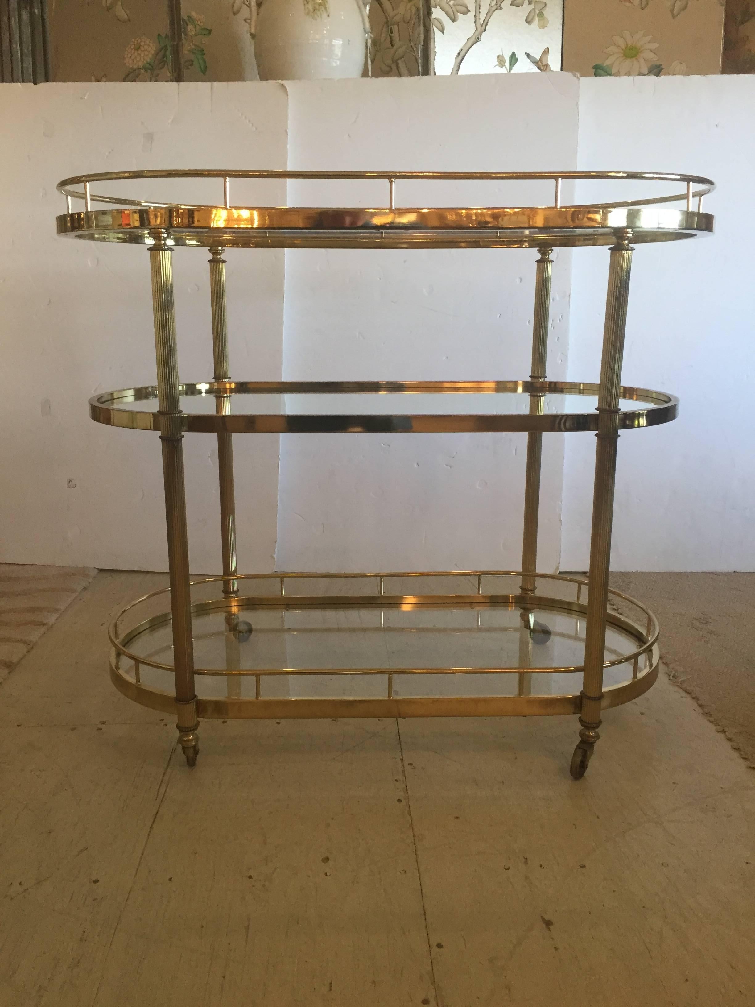 Elegant Mid-Century Modern Fluted Brass Three-Tier Oval Bar Cart In Excellent Condition In Hopewell, NJ