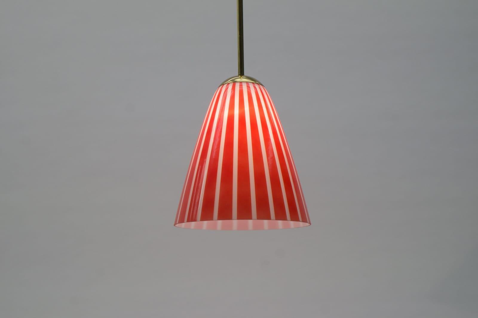 Austrian Elegant Mid-Century Modern Pendant Lamp Made of Brass and Glass, 1950s Austria For Sale