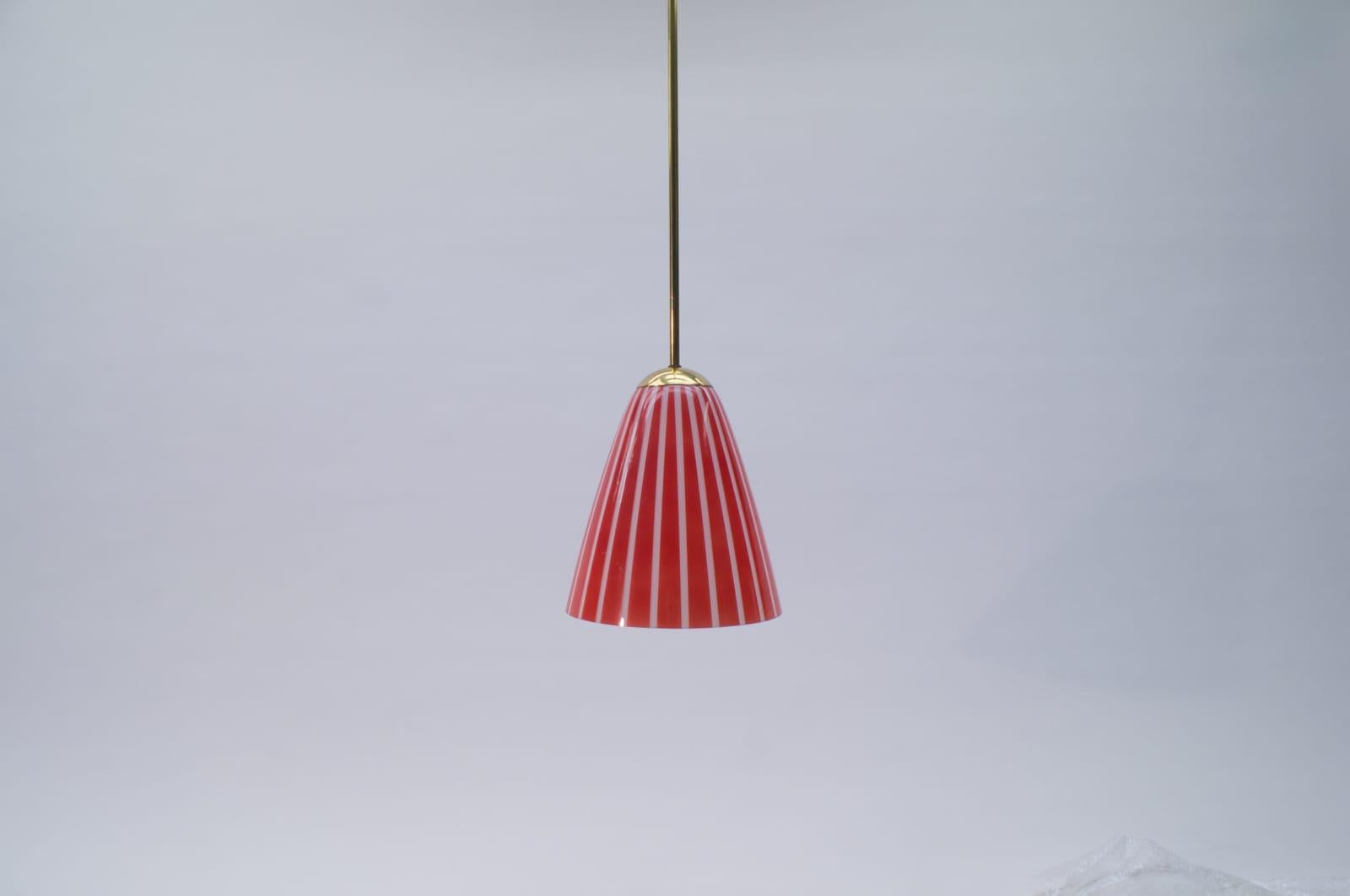 Mid-20th Century Elegant Mid-Century Modern Pendant Lamp Made of Brass and Glass, 1950s Austria For Sale