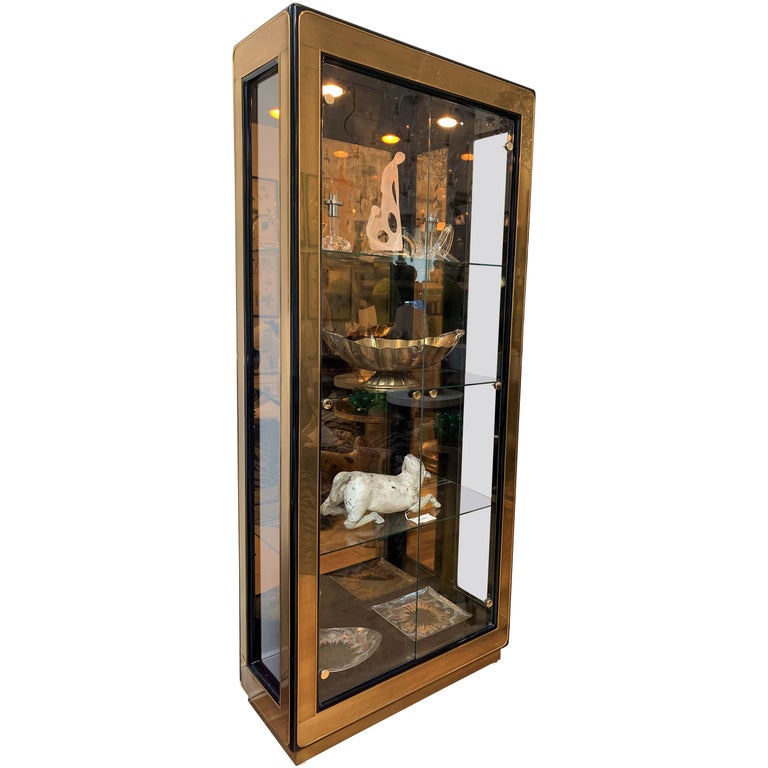 Mastercraft black lacquer and brass vitrine, 1970s, offered by Cache
